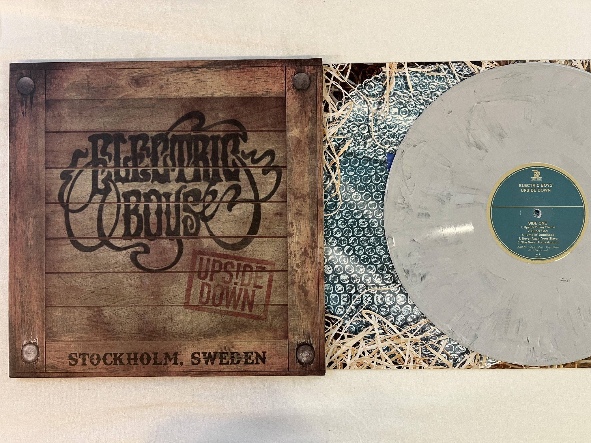 Omslagsbild för skivan ELECTRIC BOYS ups!de down LP 2021 MIGHTY MUSIC PMZ348LP2 ** GREY MARBLE **