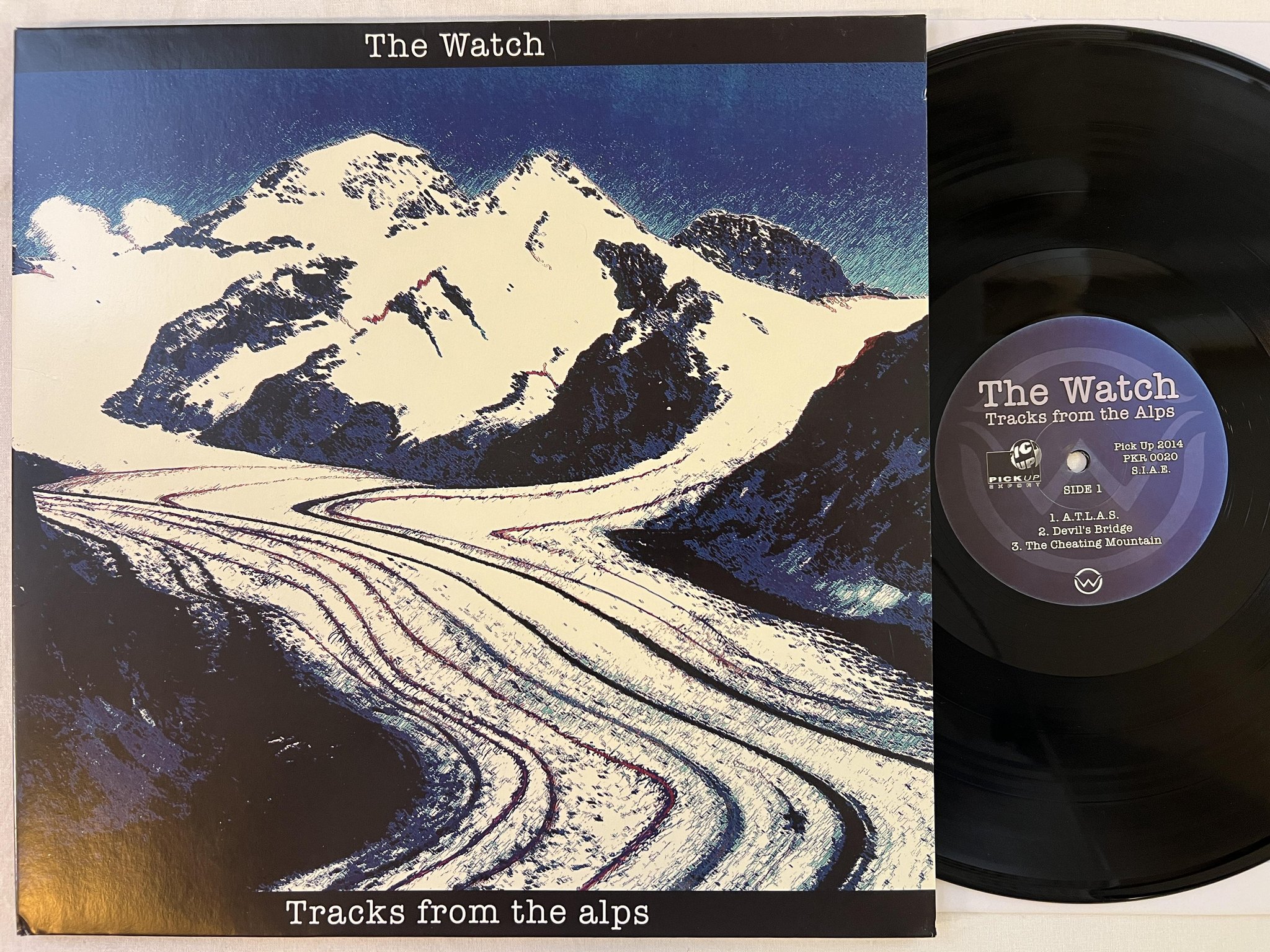 Omslagsbild för skivan THE WATCH tracks from the alps LP 2014 Ita PICK UP RECORDS PKR 0020