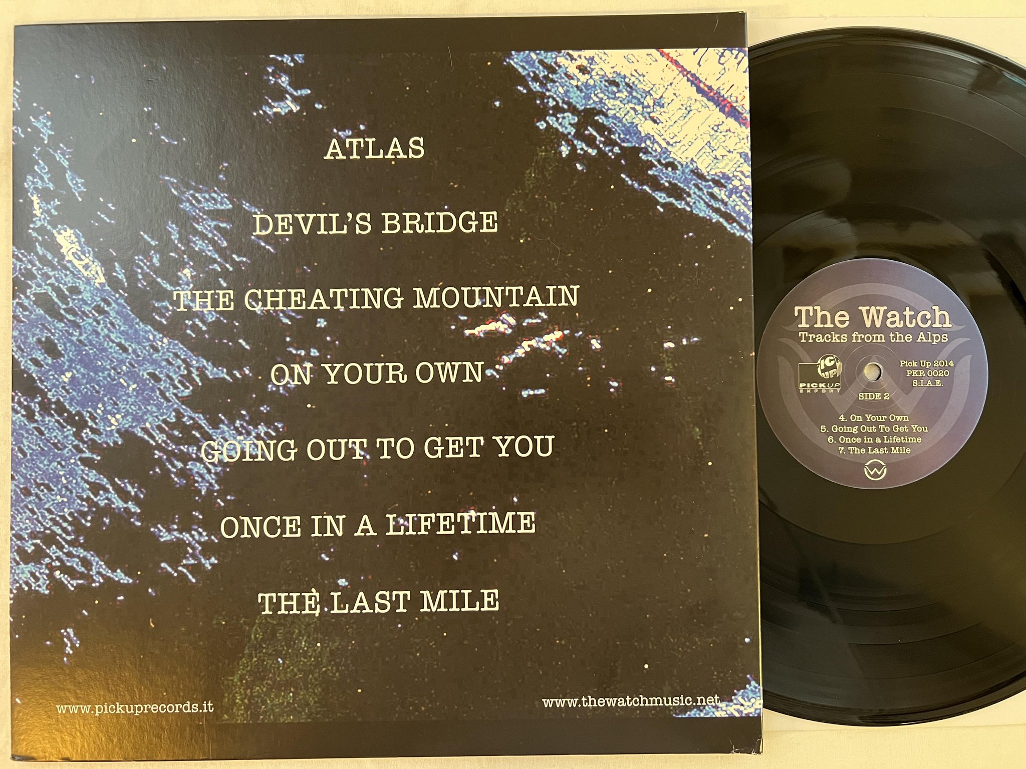 Omslagsbild för skivan THE WATCH tracks from the alps LP 2014 Ita PICK UP RECORDS PKR 0020