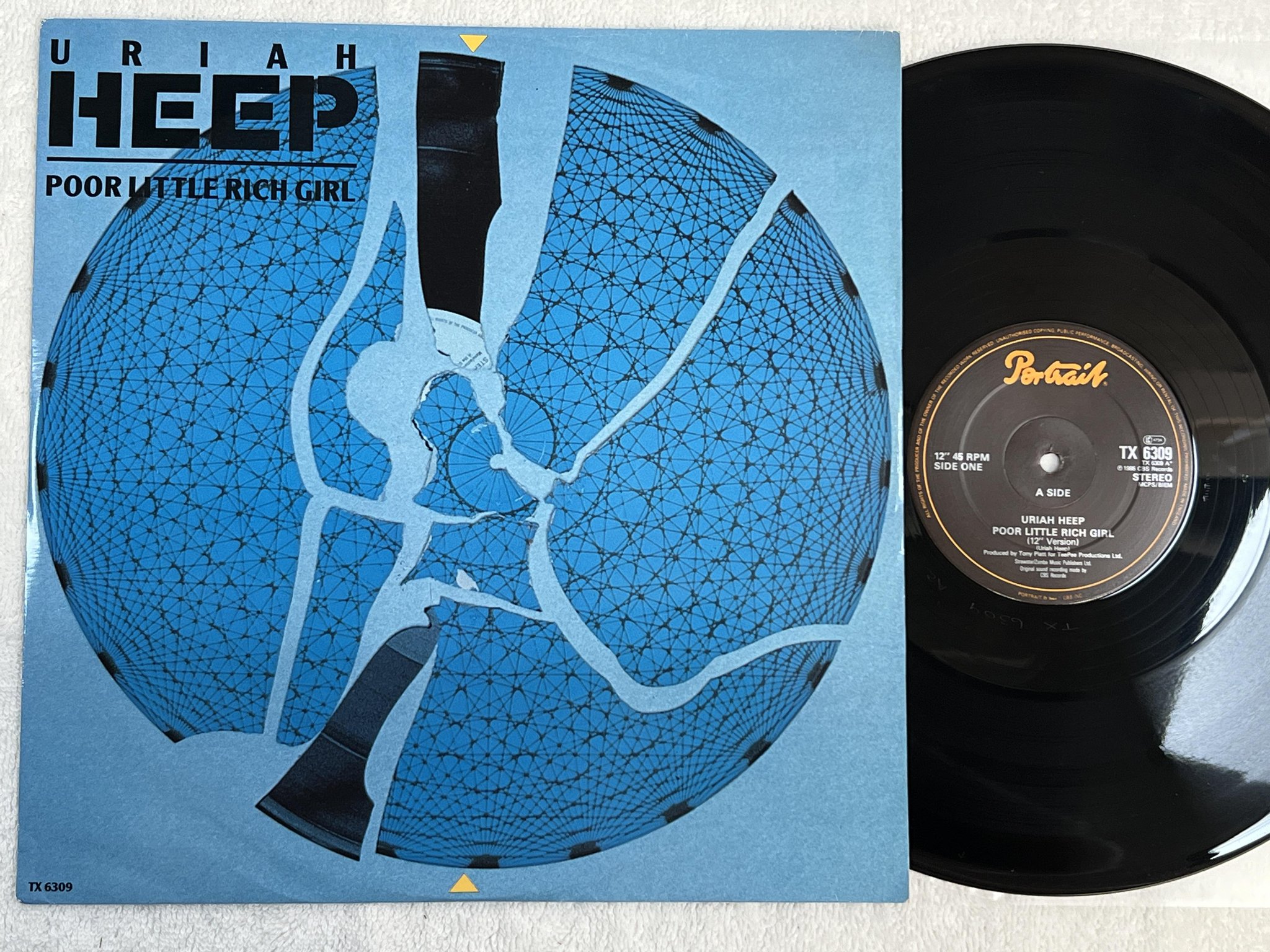 Omslagsbild för skivan URIAH HEEP Poor Little Rich Girl 12"single -85 UK PORTRAIT TX 6309