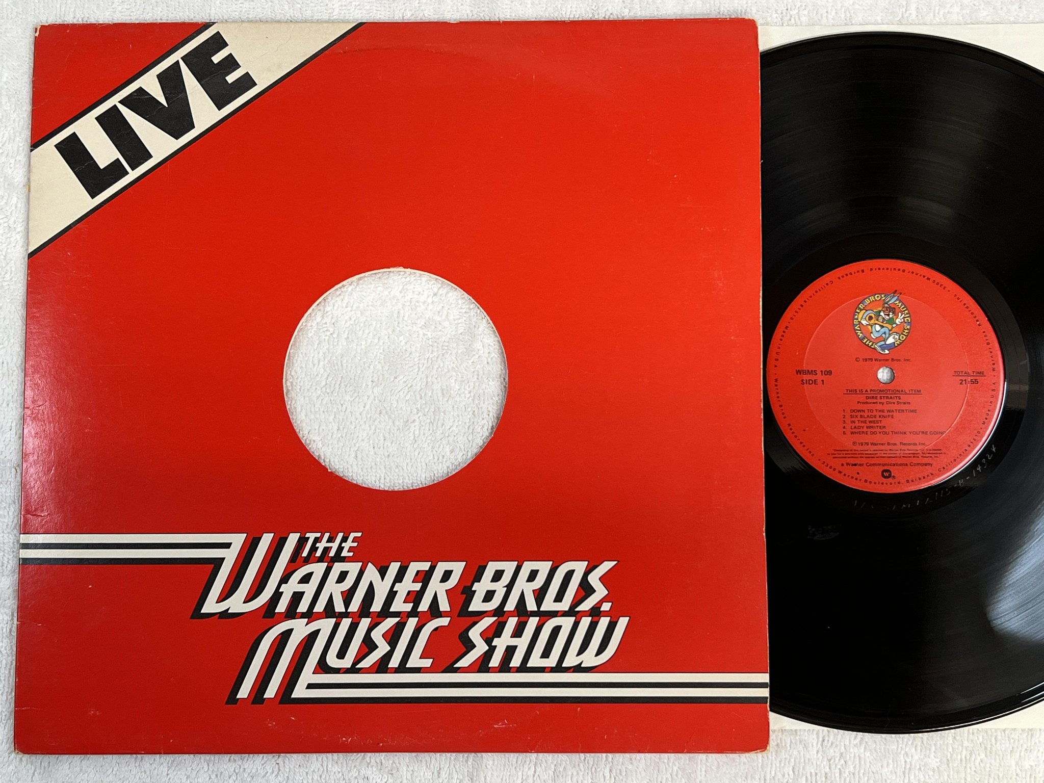 Omslagsbild för skivan DIRE STRAITS Live - The Warner Bros. Music Show LP -79 US promo WBMS 109 rare!