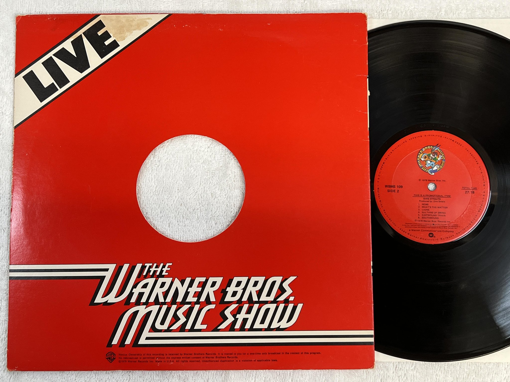Omslagsbild för skivan DIRE STRAITS Live - The Warner Bros. Music Show LP -79 US promo WBMS 109 rare!