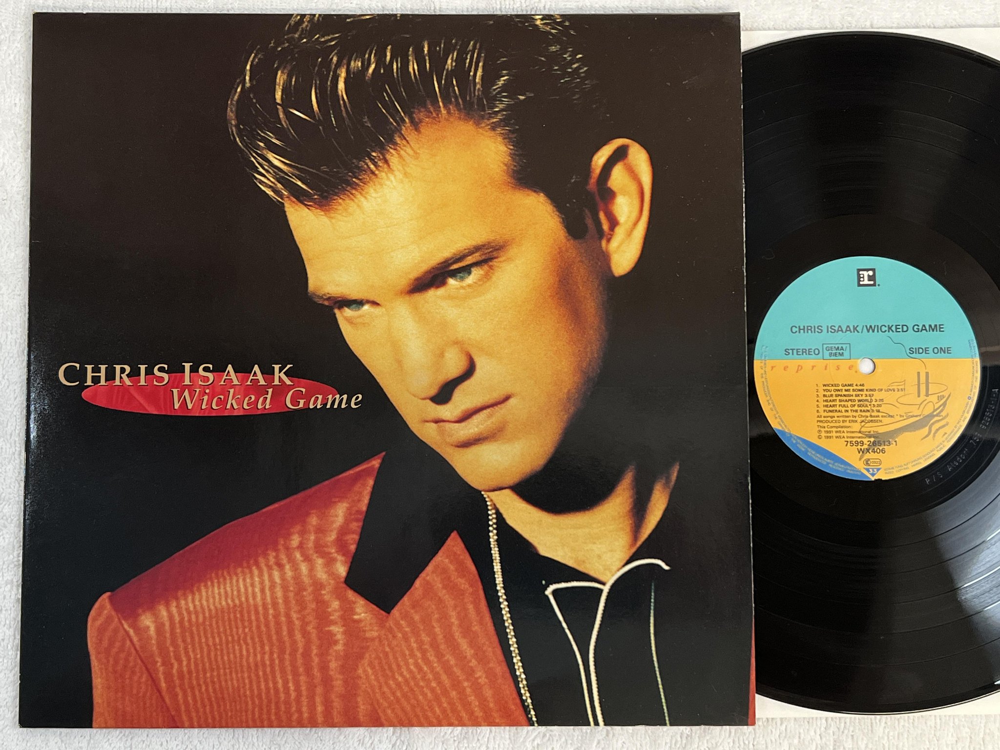 Omslagsbild för skivan CHRIS ISAAK wicked game LP -91 Ger REPRISE 7599-26513-1 *** CLASSIC ***