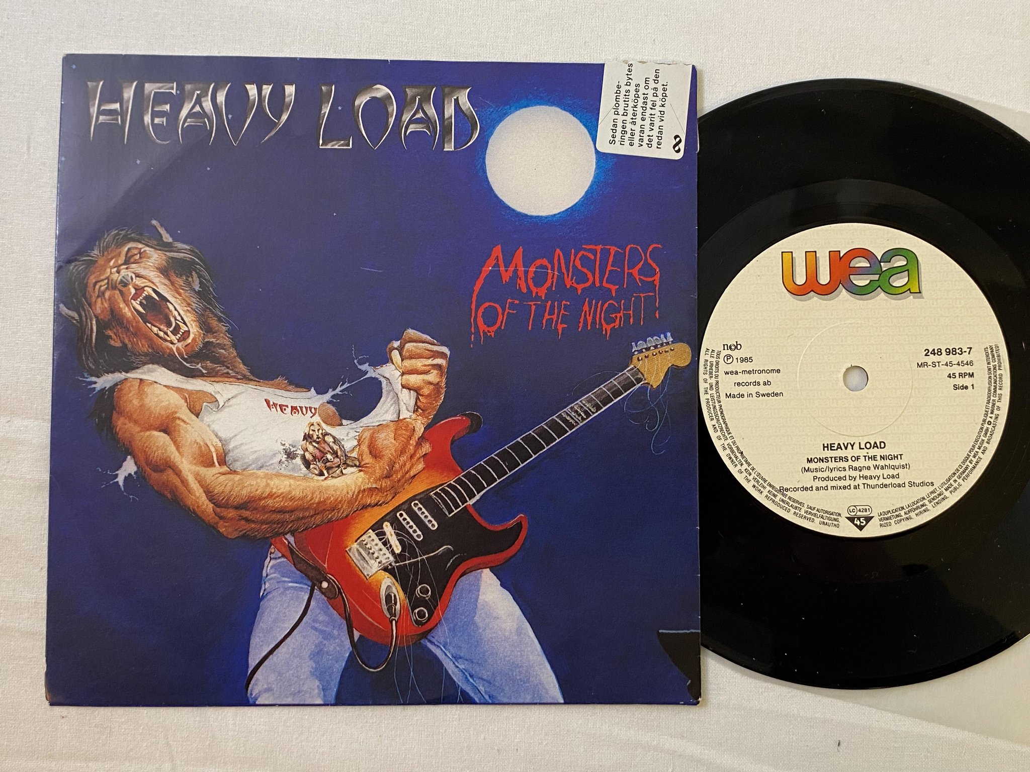 Omslagsbild för skivan HEAVY LOAD Monsters Of The Night 7" -85 Swe WEA 248983-7 *** RARE METAL ***