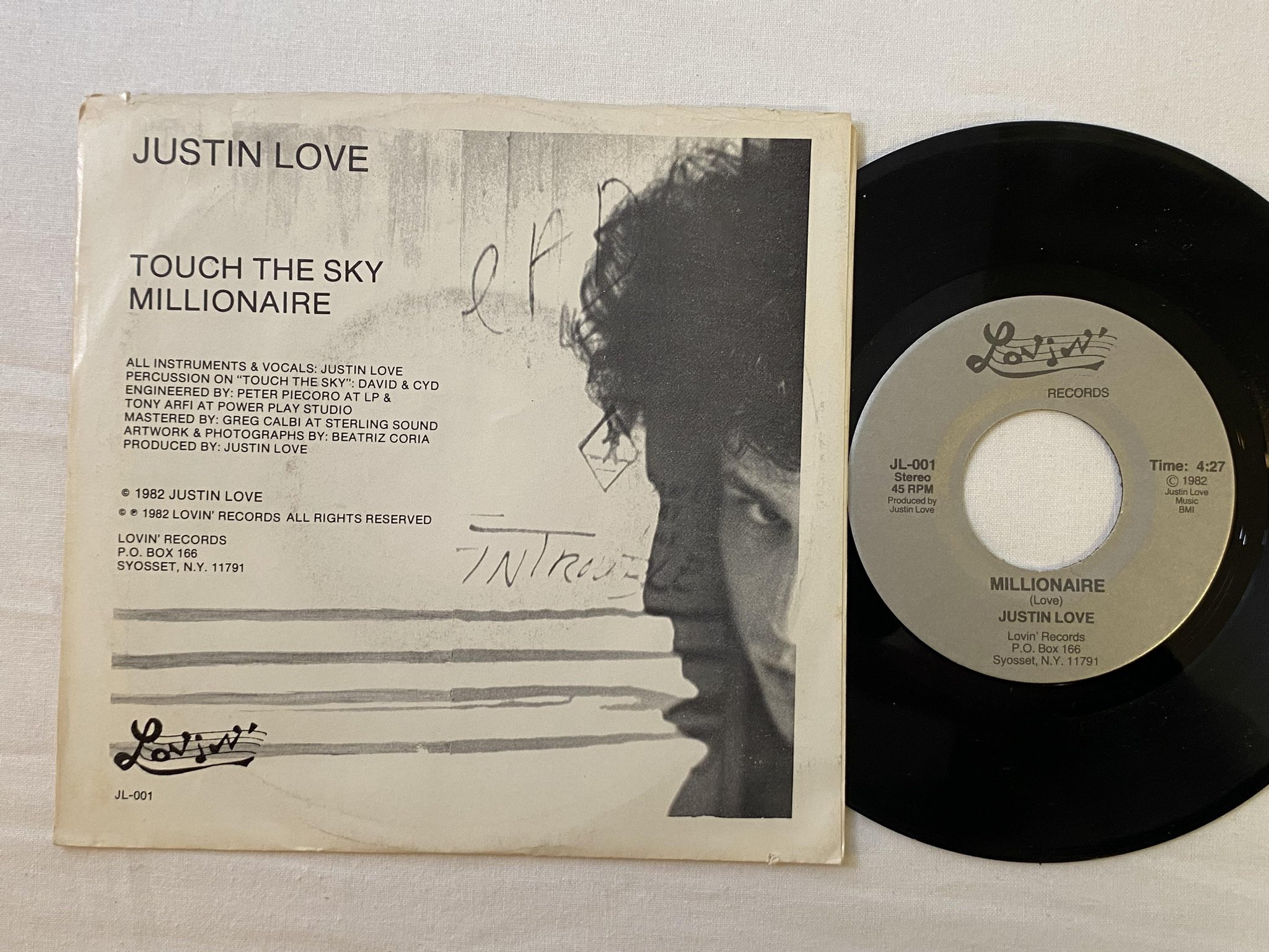 Omslagsbild för skivan JUSTIN LOVE Touch The Sky 7" -82 US LOVIN' RECORDS JL-001 ** SYNTH **