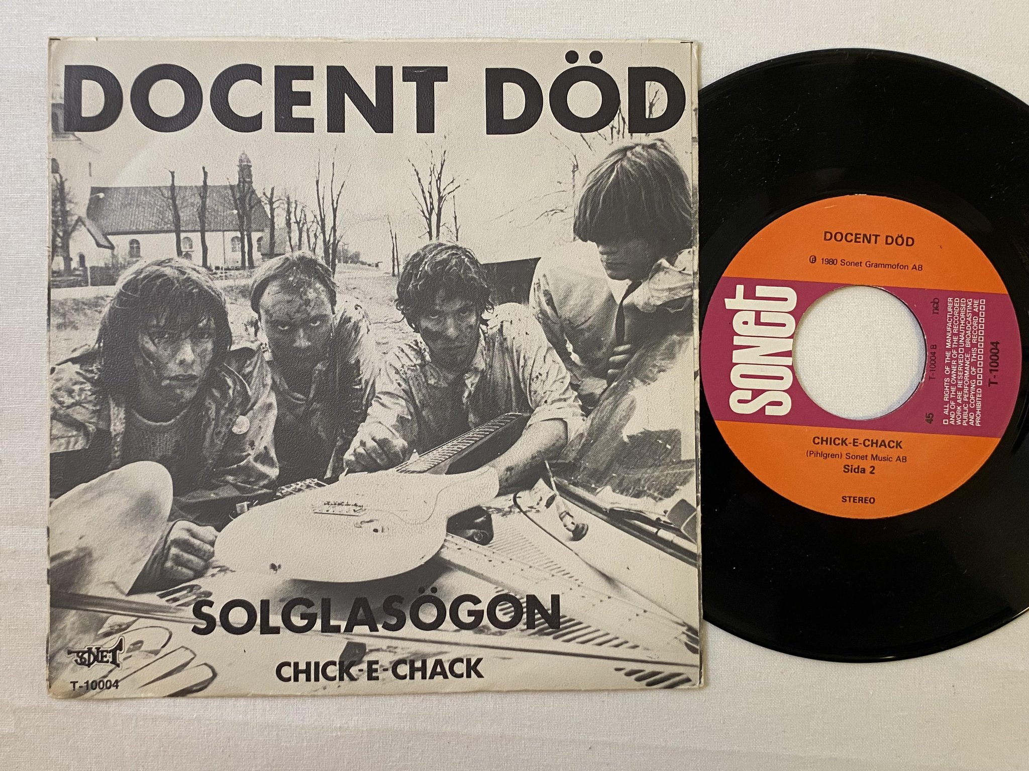 Omslagsbild för skivan DOCENT DÖD solglasögon 7" -80 Swe SONET T-10004