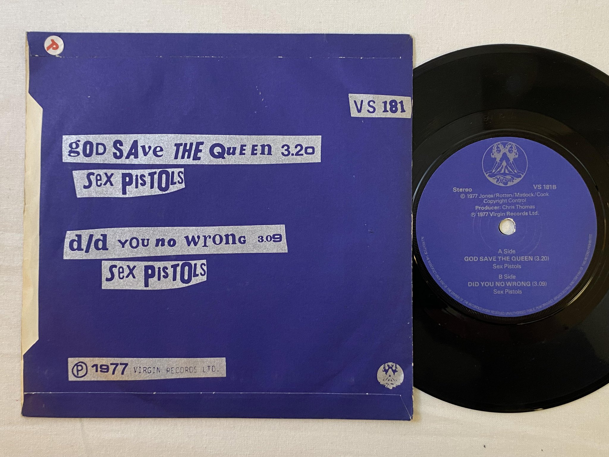 Omslagsbild för skivan SEX PISTOLS god save the queen 7" -77 UK VIRGIN VS 181 ** silver text **