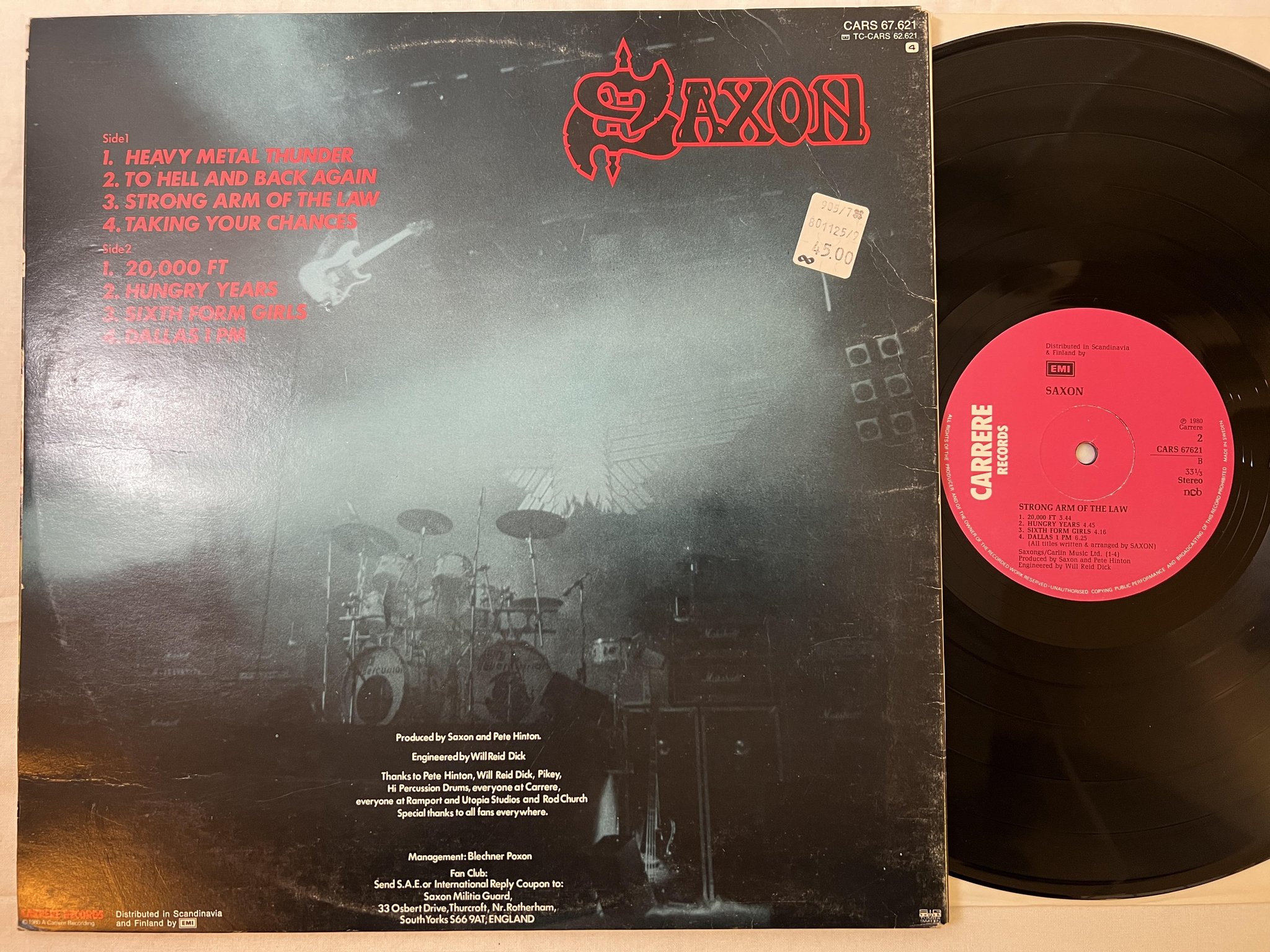 Omslagsbild för skivan SAXON strong arm of the law LP -80 ncb CARRERE CARS 67621