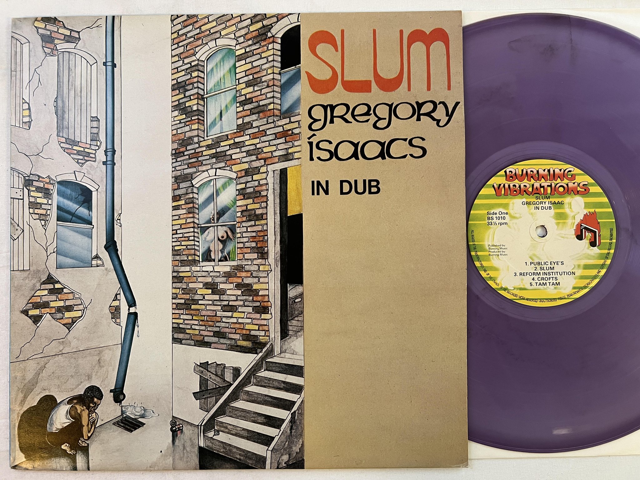 Omslagsbild för skivan GREGORY ISAAC slum in dub LP -79 UK BURNING VIBRATIONS BS 1010 * purple vinyl *