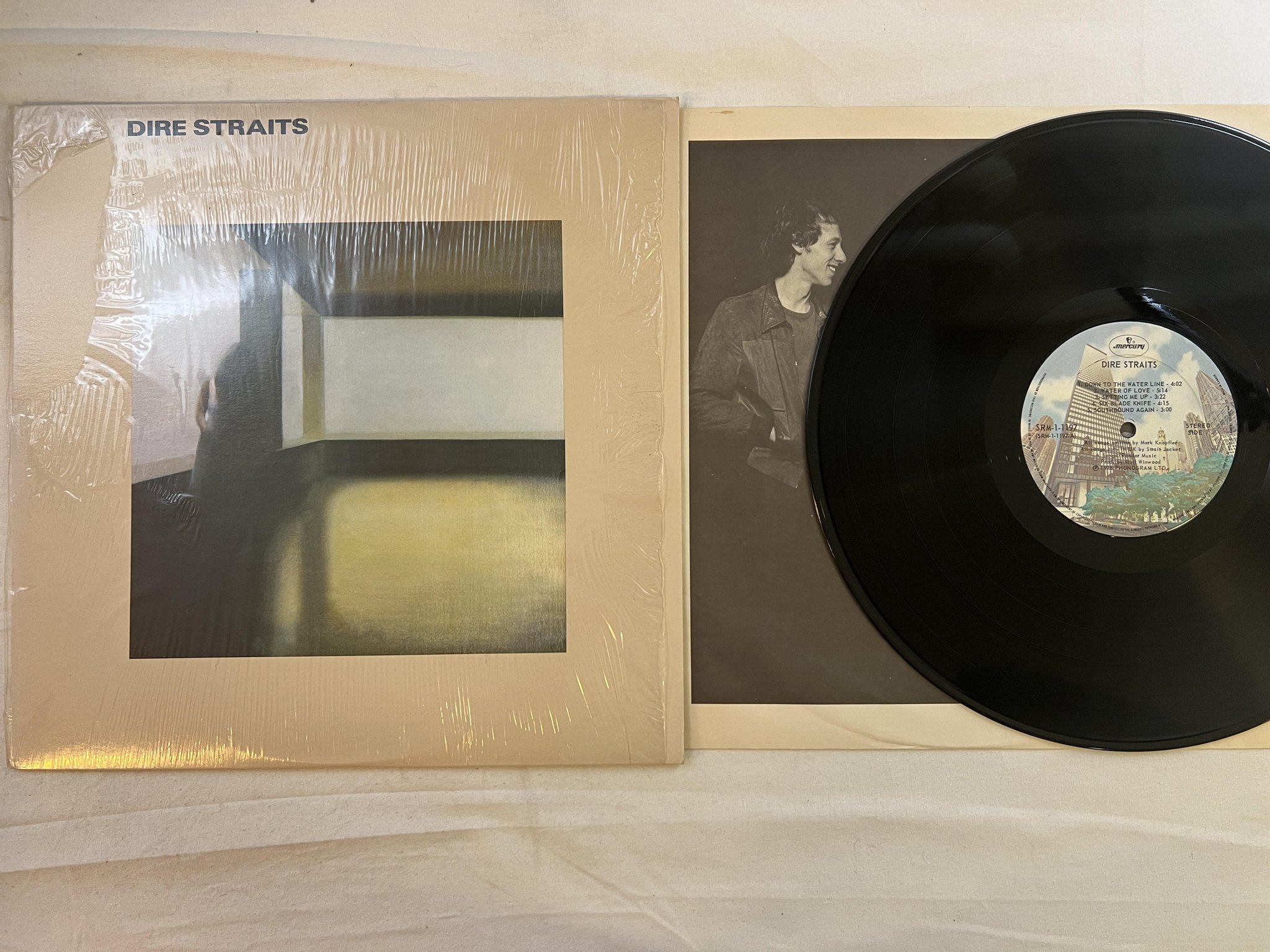 Omslagsbild för skivan DIRE STRAITS s/t LP -78 Can MERCURY SRM-1-1197