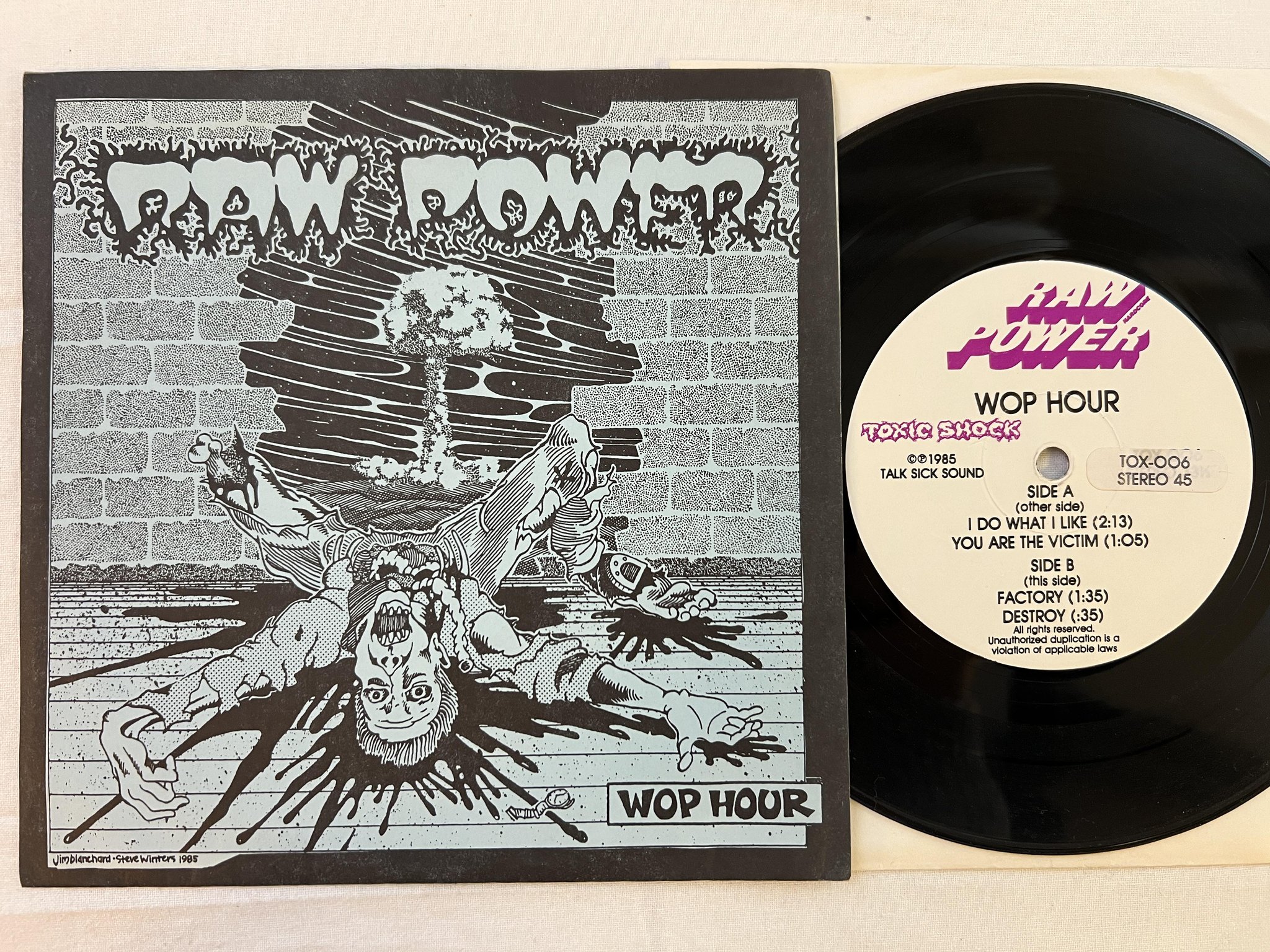 Omslagsbild för skivan RAW POWER Wop Hour 7" -85 US TOXIC SHOCK TOX 006 ** Navy Blue **