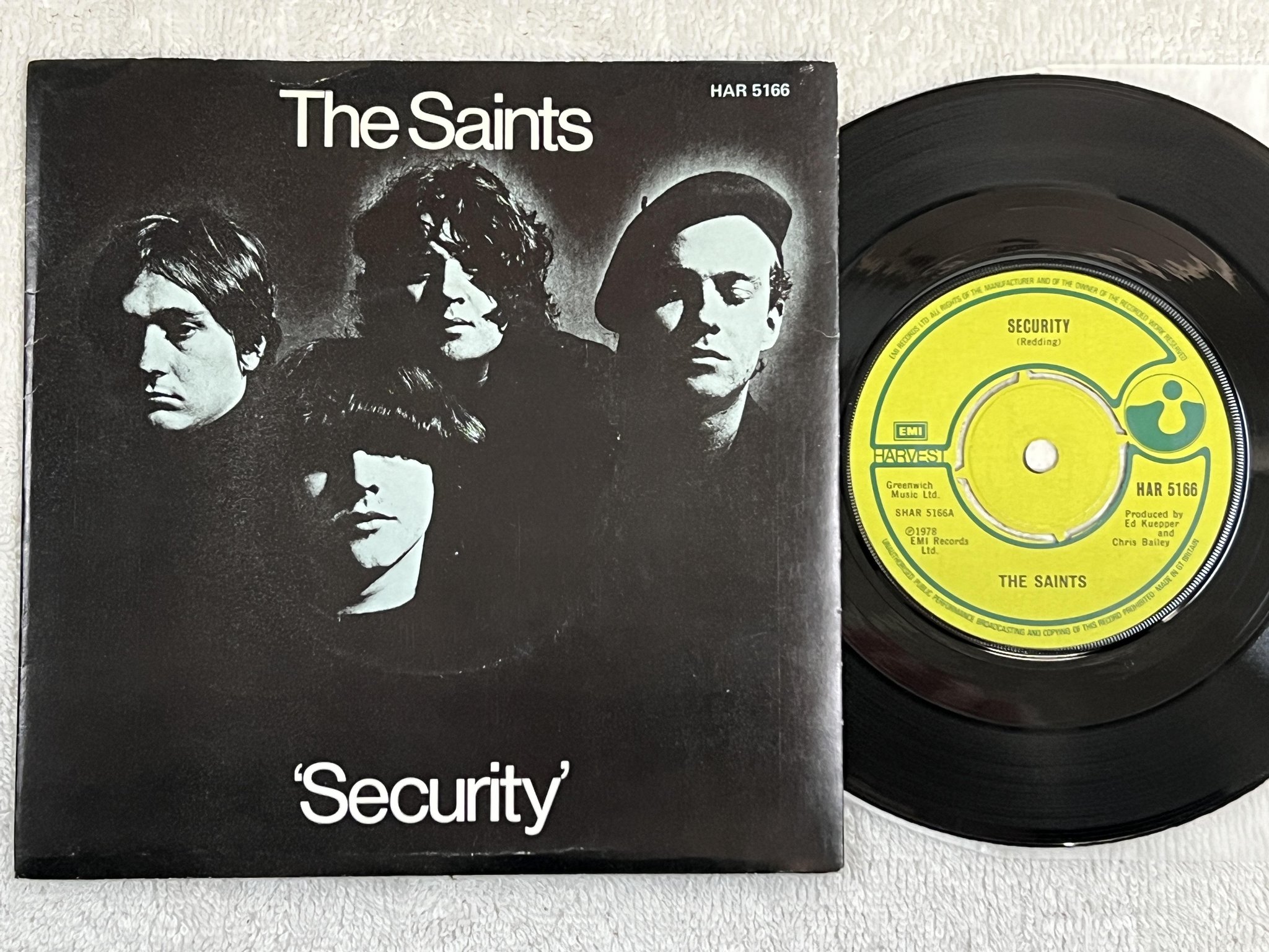 Omslagsbild för skivan THE SAINTS security 7" -78 UK HARVEST HAR 5166