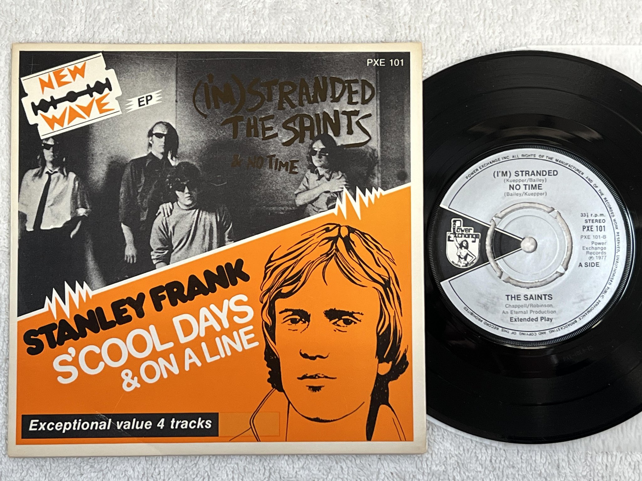 Omslagsbild för skivan THE SAINTS / STANLEY FRANK split-7" -77 UK POWER EXCHANGE PXE 101