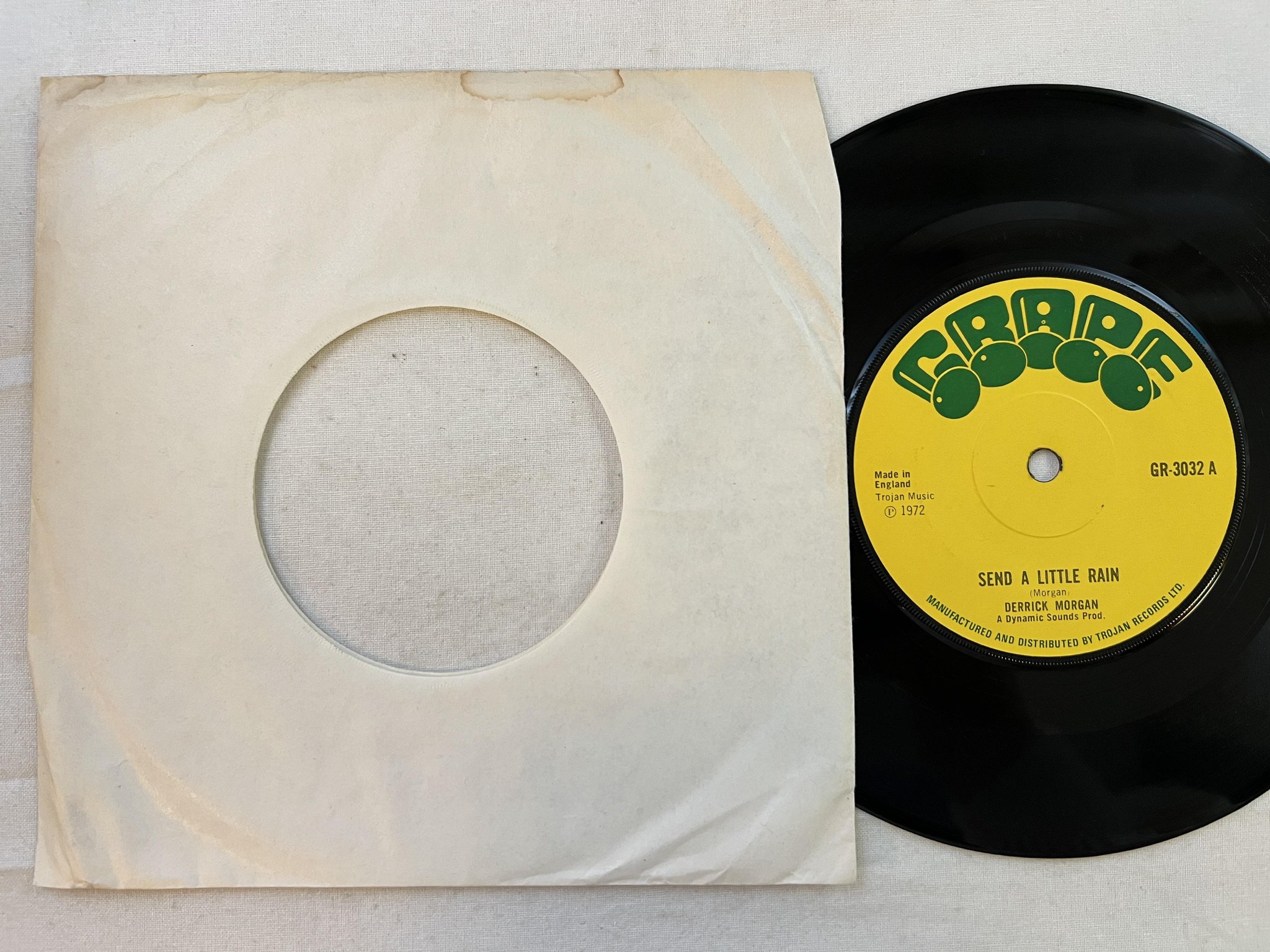Omslagsbild för skivan DERRICK MORGAN send a little rain 7" -72 UK GRAPE GR 3032