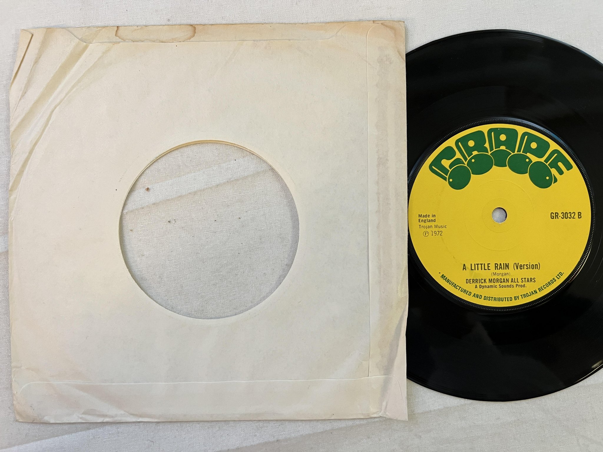Omslagsbild för skivan DERRICK MORGAN send a little rain 7" -72 UK GRAPE GR 3032