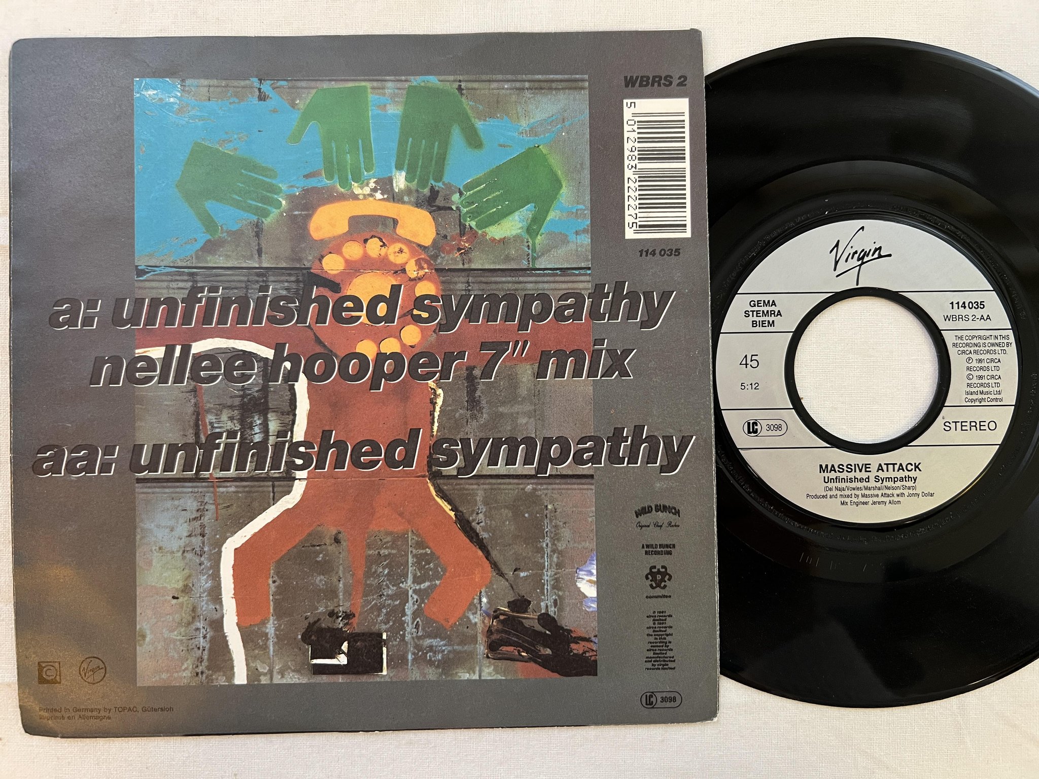 Omslagsbild för skivan MASSIVE ATTACK unfinished symphony 7" -91 Hol VIRGIN 114035