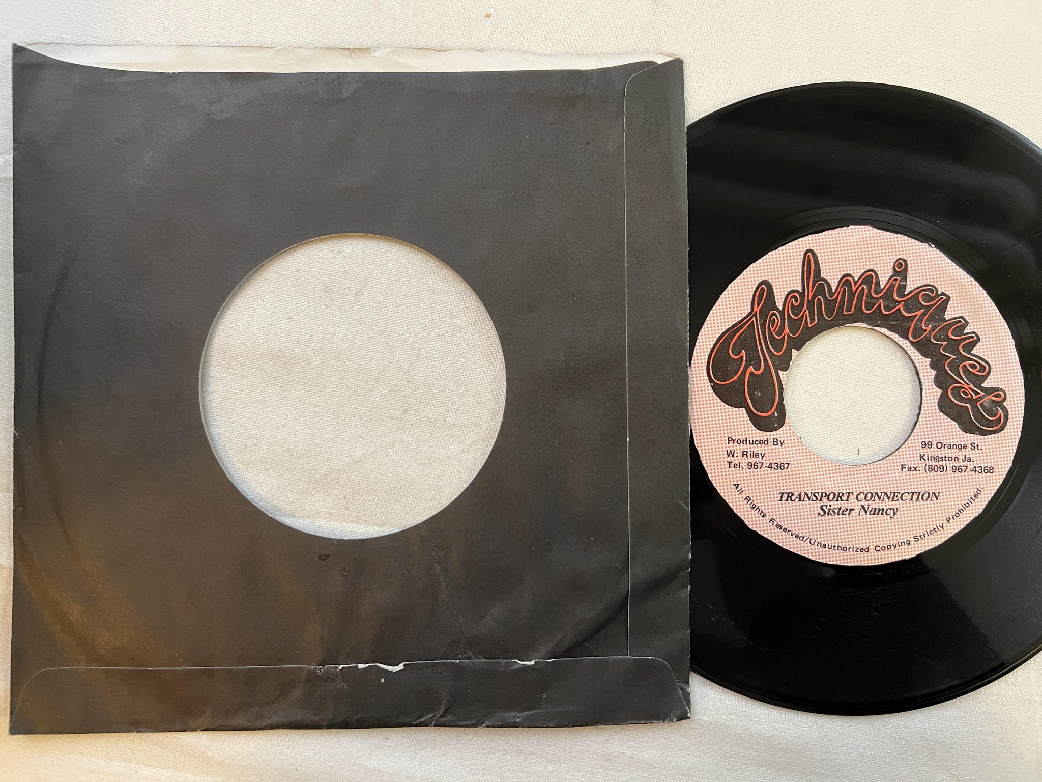 Omslagsbild för skivan SISTER NANCY transport connection 7" Jamaica TECHNIQUES