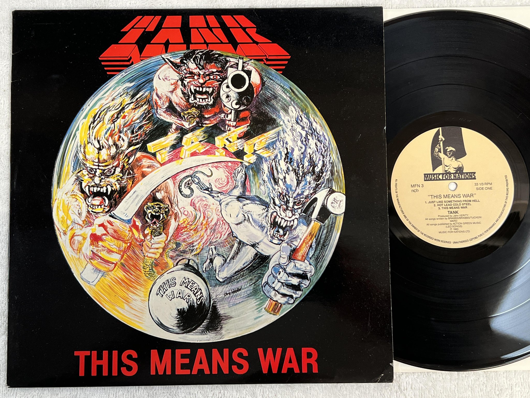 Omslagsbild för skivan TANK this means war LP -83 ncb MUSIC FOR NATIONS MFN 3
