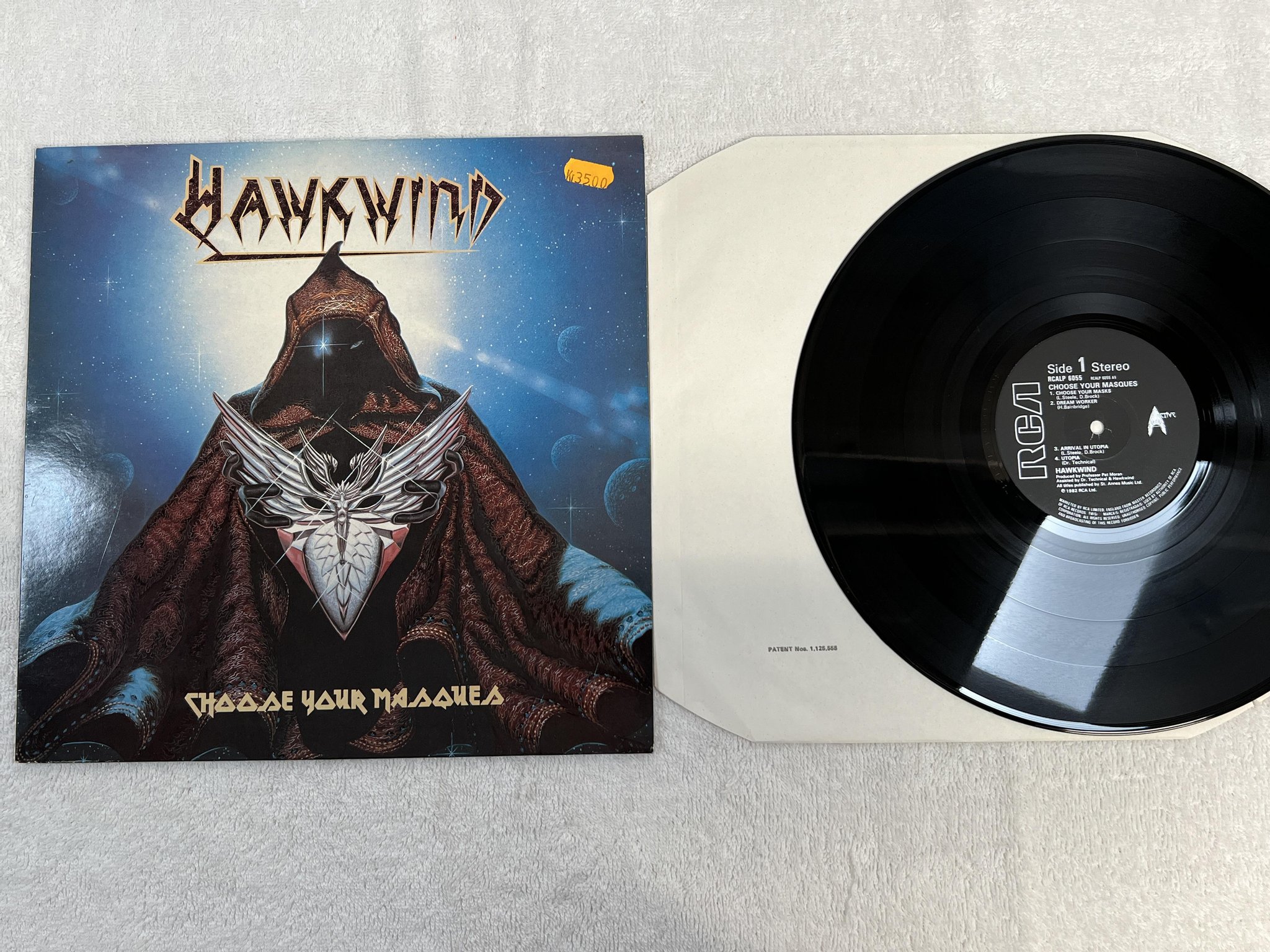 Omslagsbild för skivan HAWKWIND Choose Your Masques LP -82 UK RCA RCALP 6055 *** space rock ***