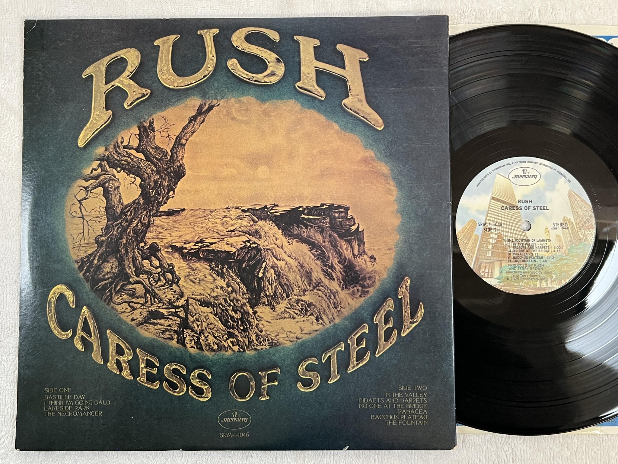 Omslagsbild för skivan RUSH caress of steel LP -75 US MERCURY SRM 1-1046