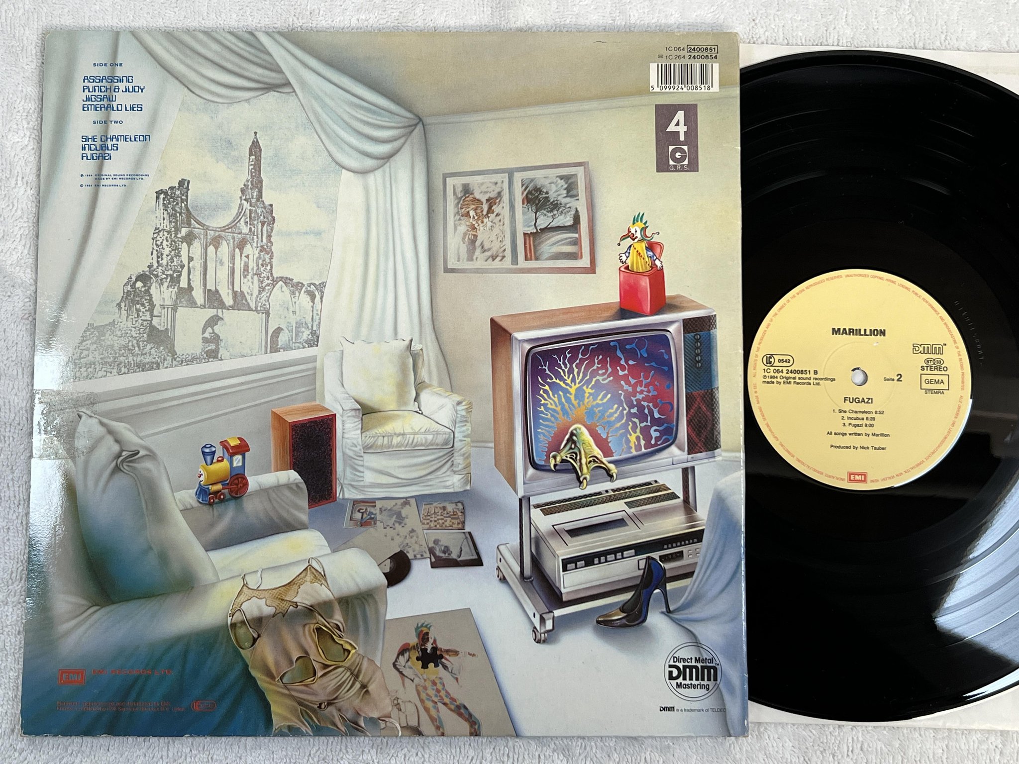 Omslagsbild för skivan MARILLION fugazi LP -84 Ger EMI 1C 064 2400851