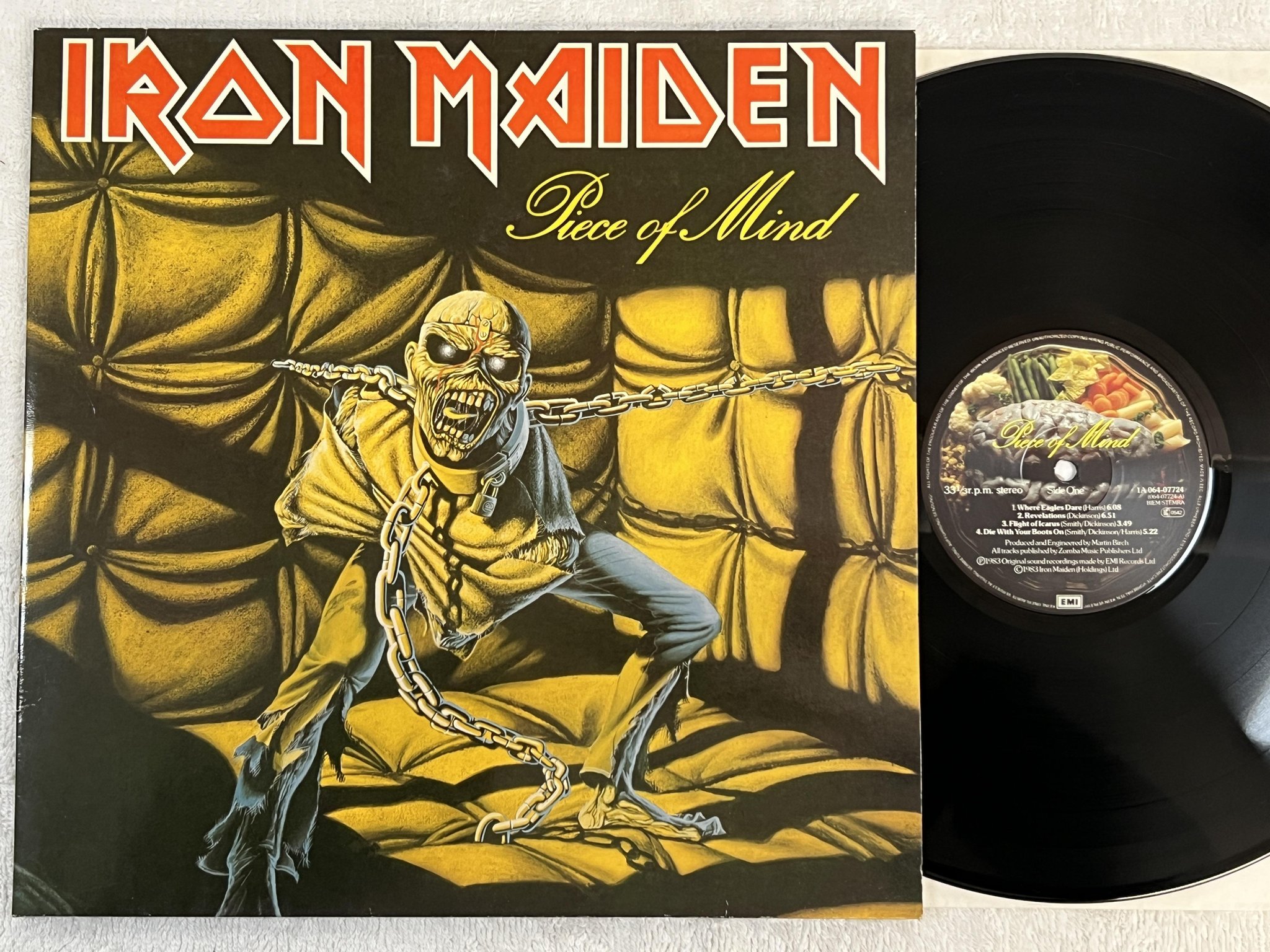Omslagsbild för skivan IRON MAIDEN piece of mind LP -83 Hol EMI 1C 064-07724