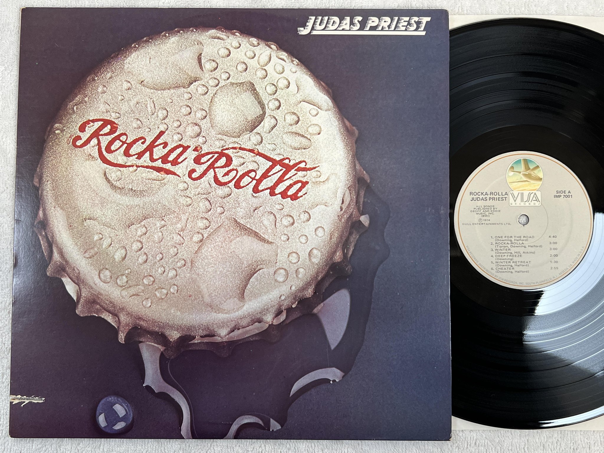 Omslagsbild för skivan JUDAS PRIEST Rocka Rolla LP -74/79 US VISA IMP 7001