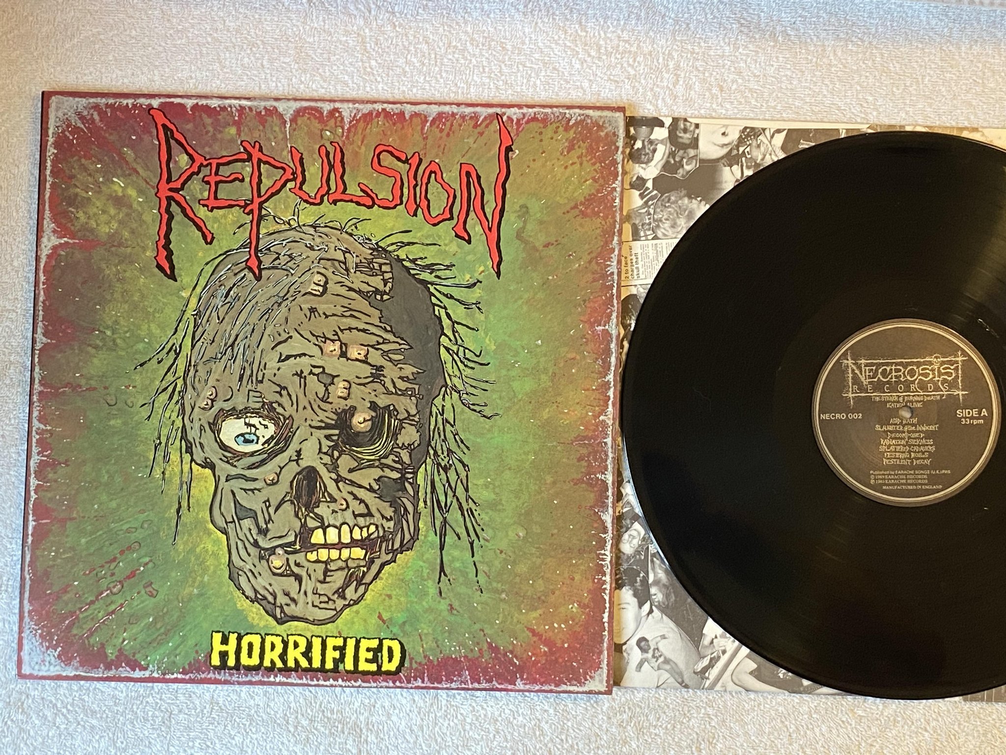 Omslagsbild för skivan REPULSION Horrified LP -89 UK NECROSIS NECRO 002 *** rare death metal ***