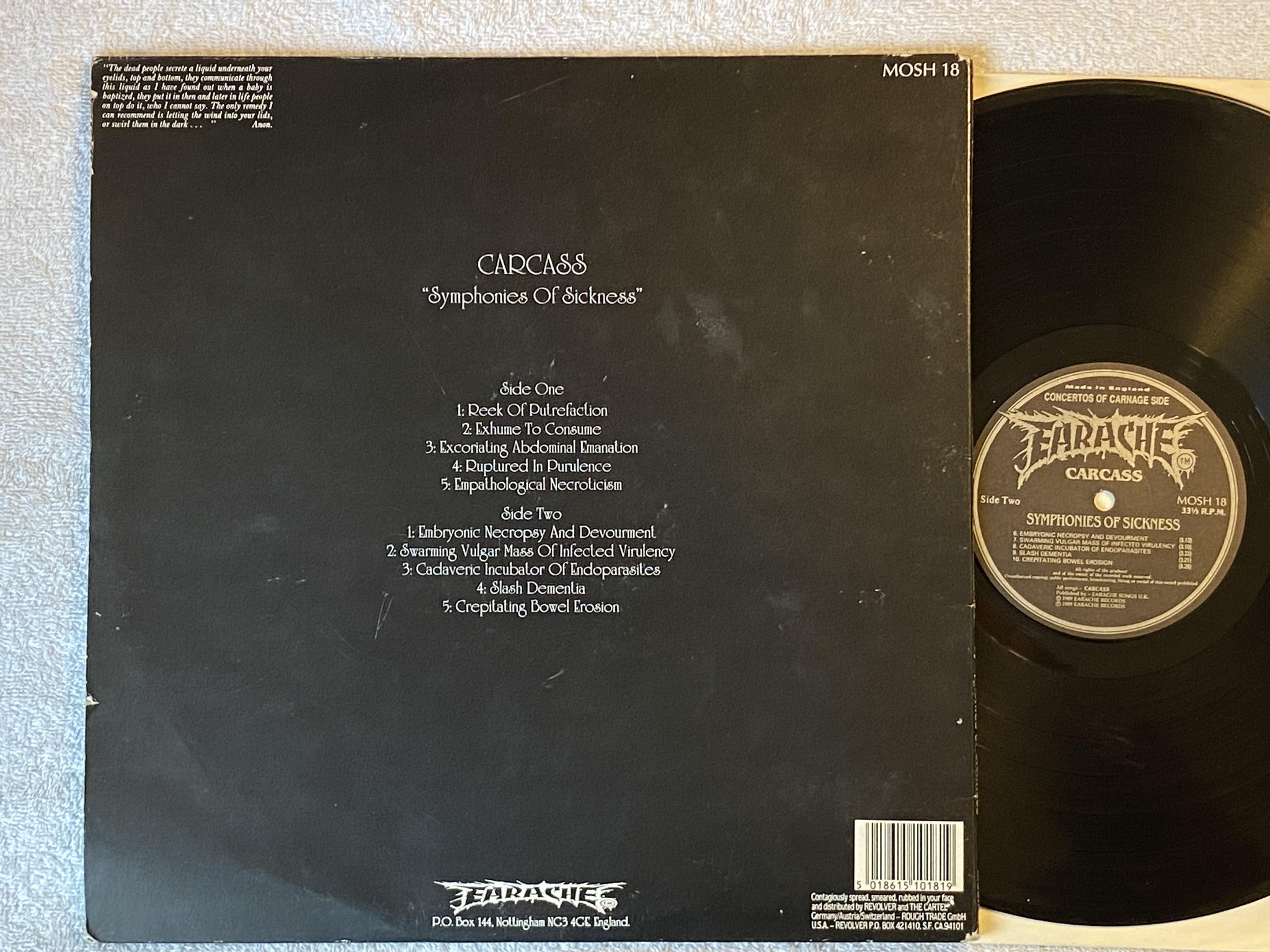 Omslagsbild för skivan CARCASS symphonies of sickness LP -89 UK EARACHE MOSH 18