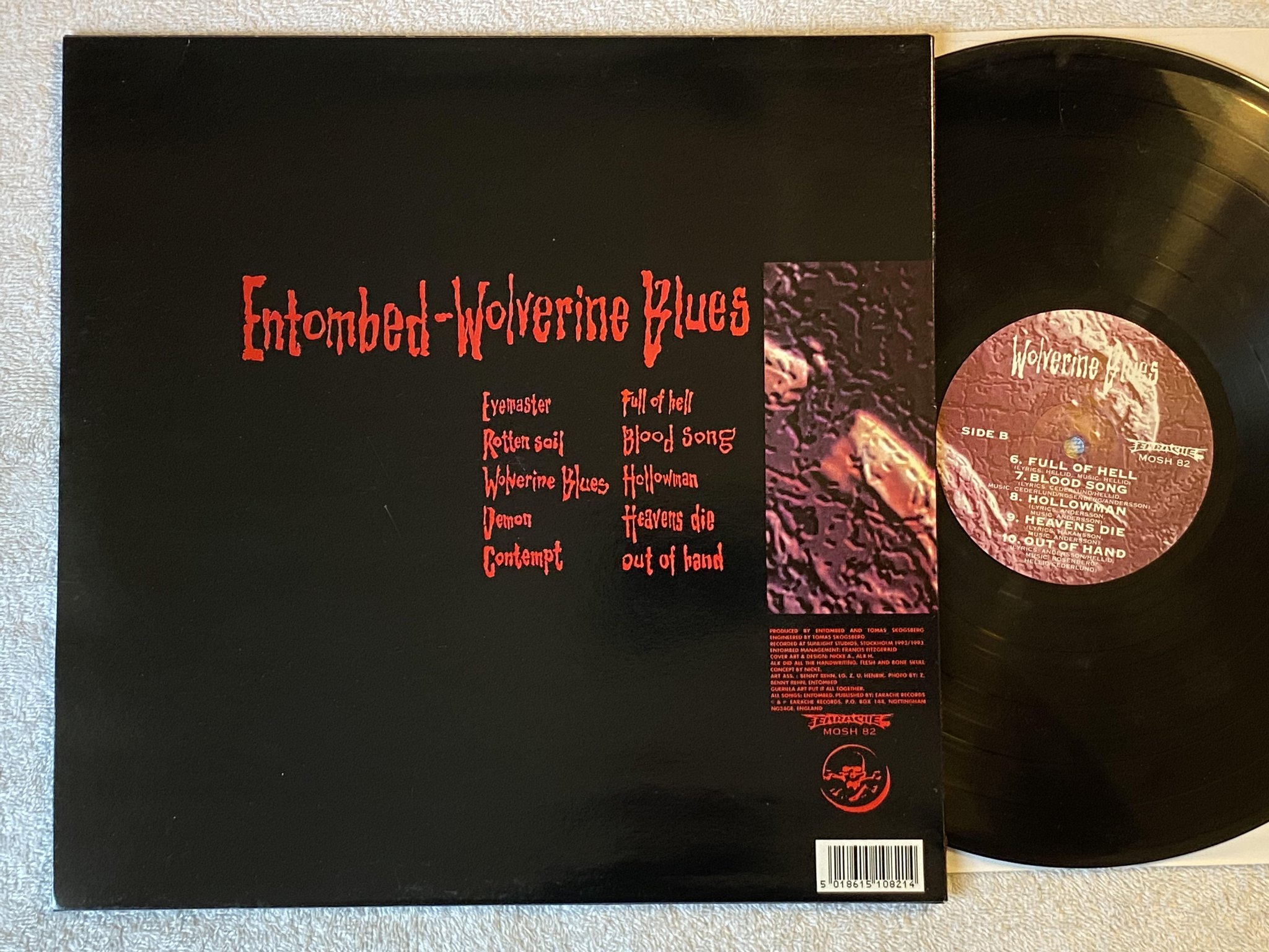 Omslagsbild för skivan ENTOMBED wolverine blues LP -93 UK EARACHE MOSH 82 *** RARE DEATH METAL ***