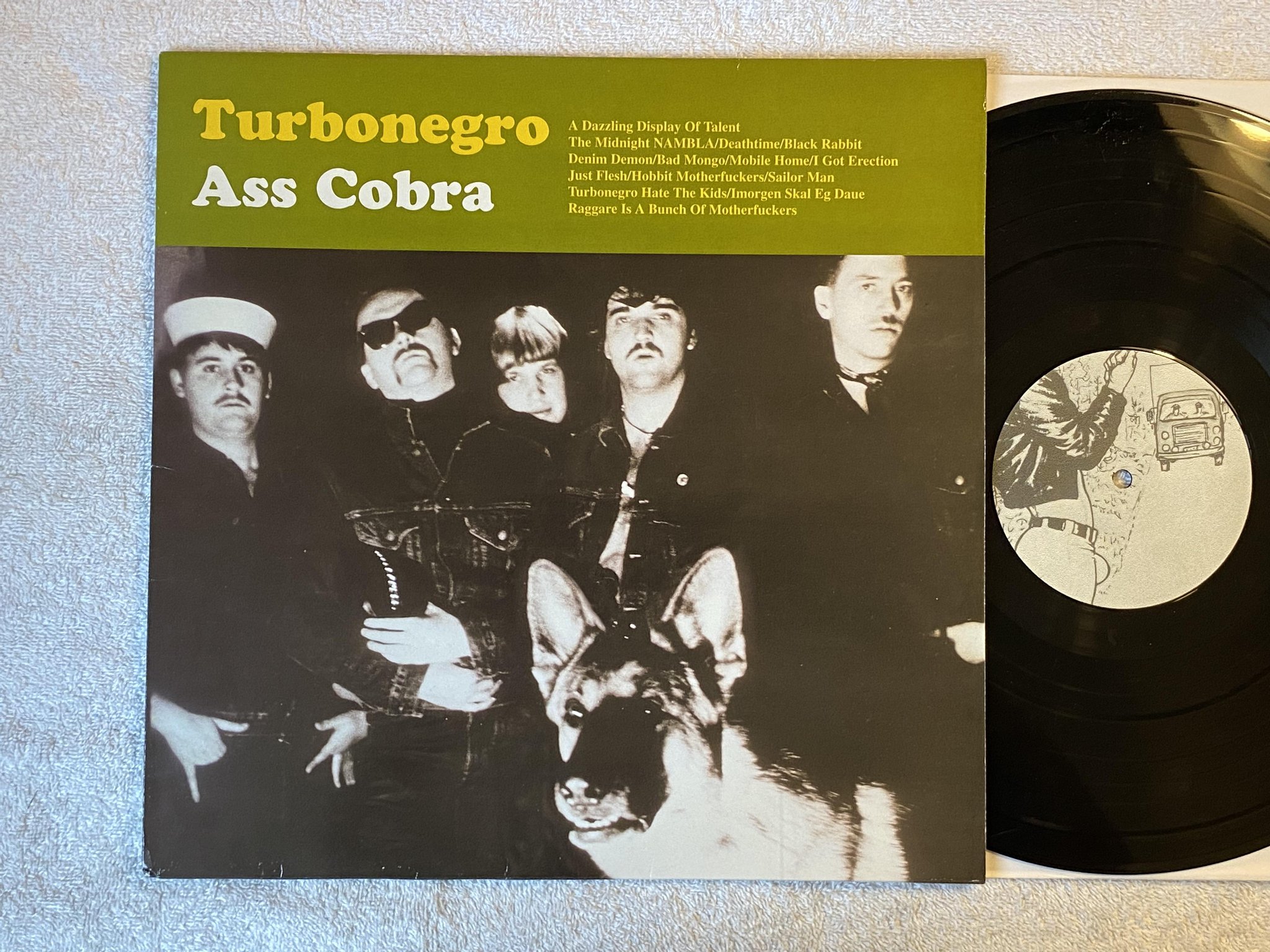 Omslagsbild för skivan TURBONEGRO Ass Cobra LP -96 Ger BOOMBA REC boomba 001-1 *** rare ***