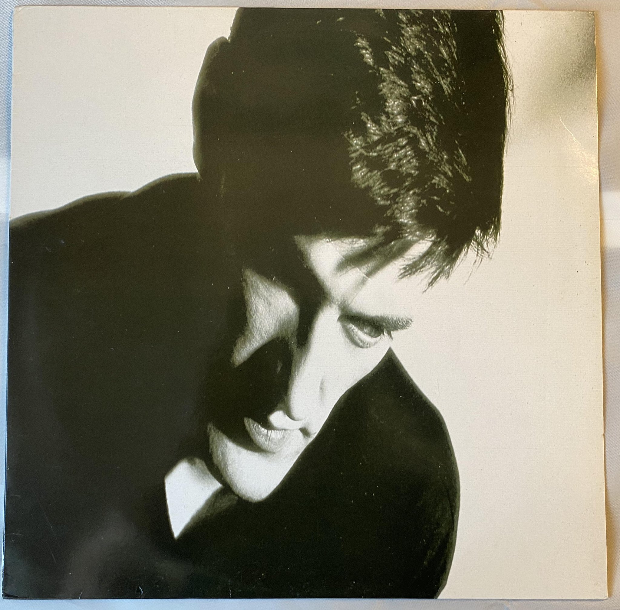 Omslagsbild för skivan NEW ORDER Low-Life LP -85 Swe FACTORY Fact 100 *** w/ printed plastic bag ***