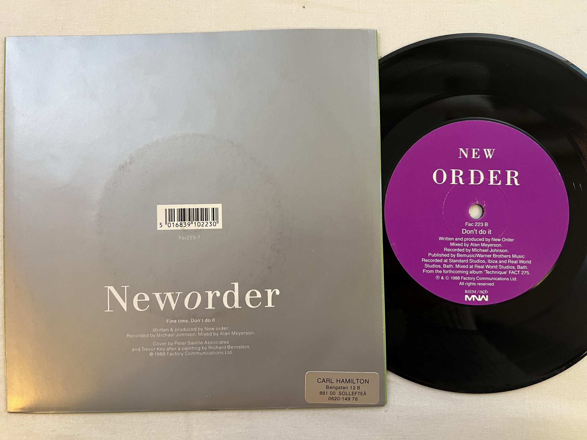 Omslagsbild för skivan NEW ORDER fine time 7" -88 ncb MNW Fac 223