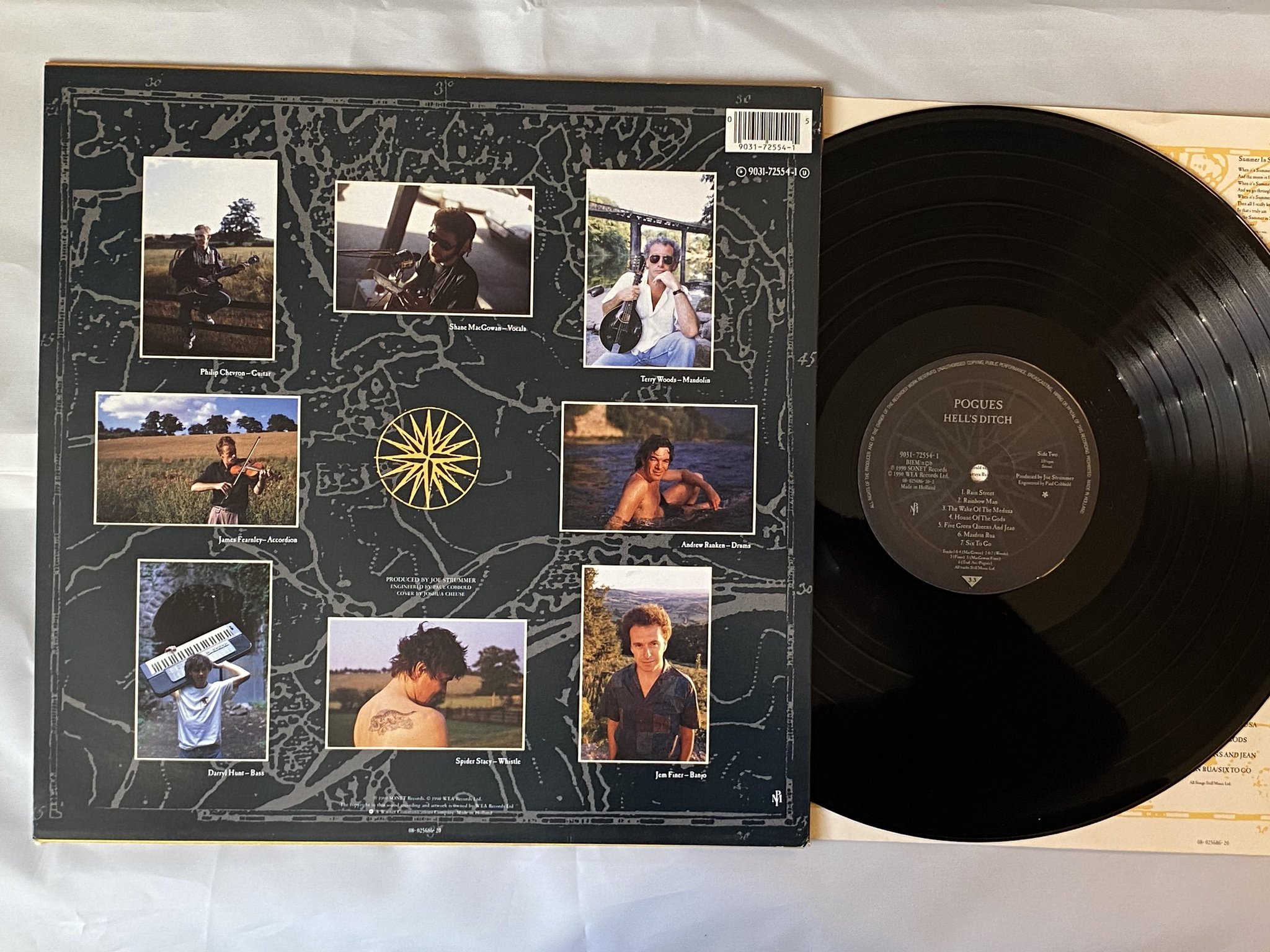 Omslagsbild för skivan THE POUGES Hell's Ditch LP -90 pogue mahone 9031-72554-1