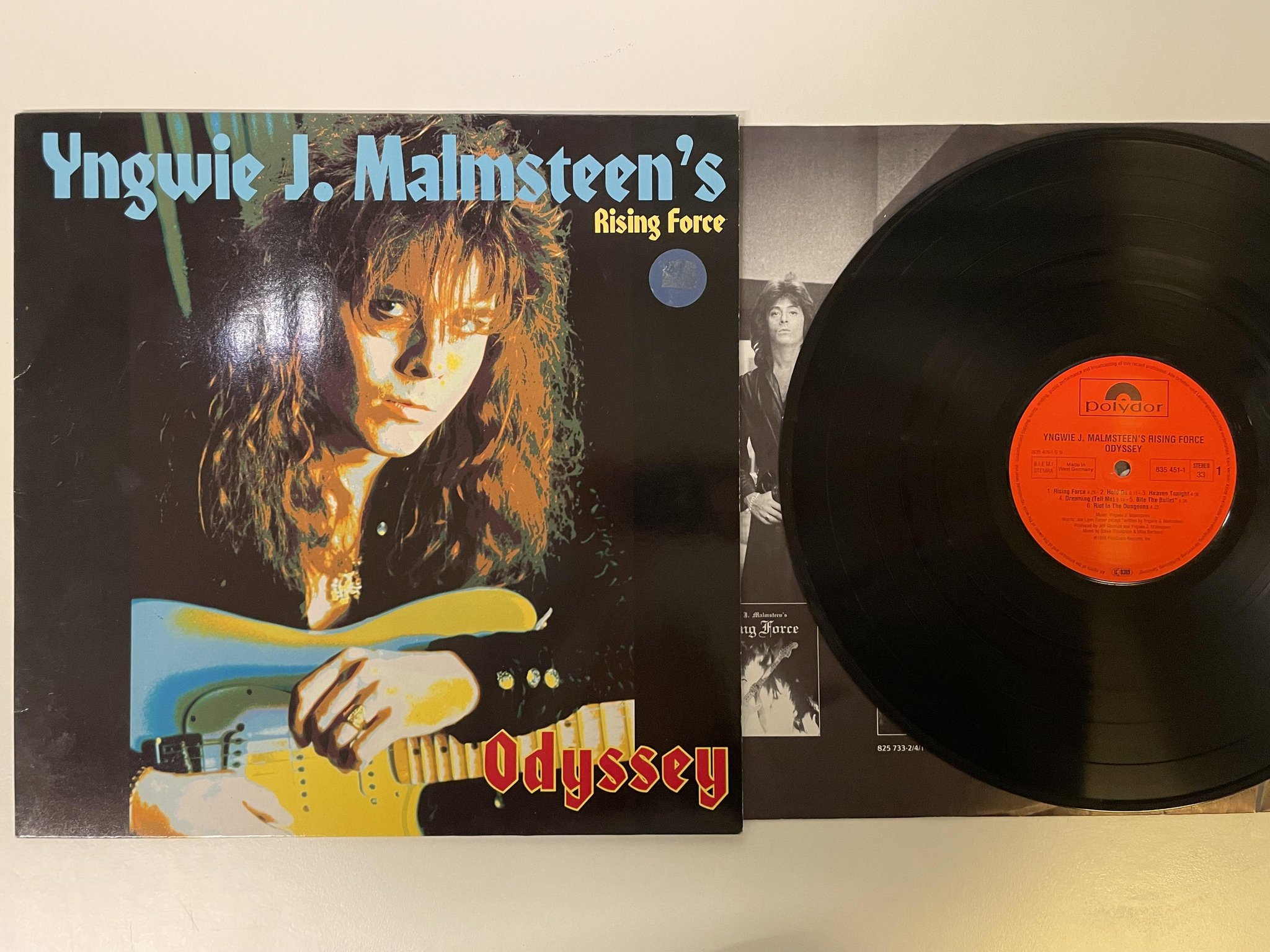 Omslagsbild för skivan YNGWIE J. MALMSTEEN'S RISING FORCE odyssey LP -88 Ger POLYDOR 835451-1