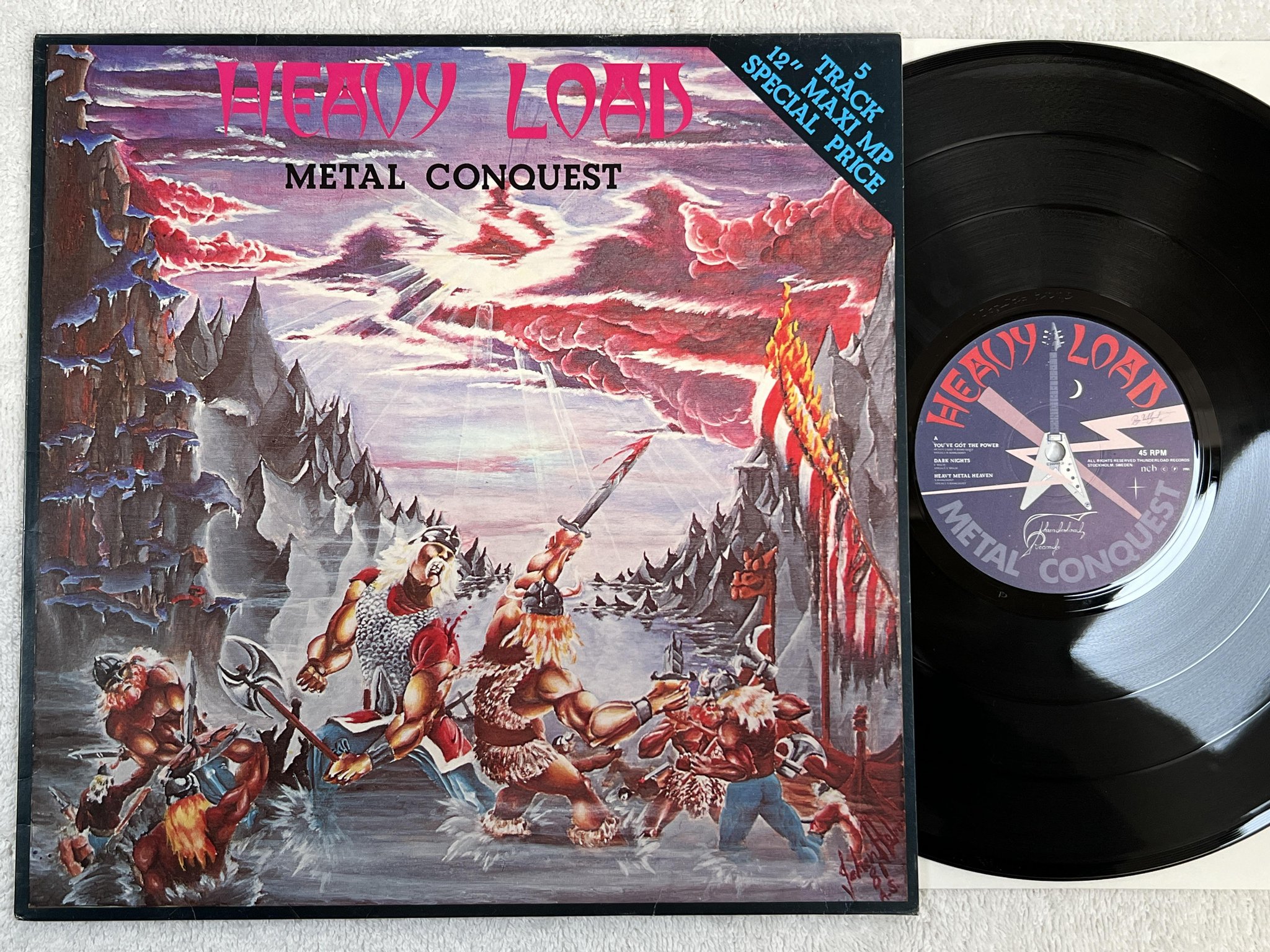 Omslagsbild för skivan HEAVY LOAD Metal Conquest 12"ep -81 THUNDERLOAD TMP 811 *** POSTER ***
