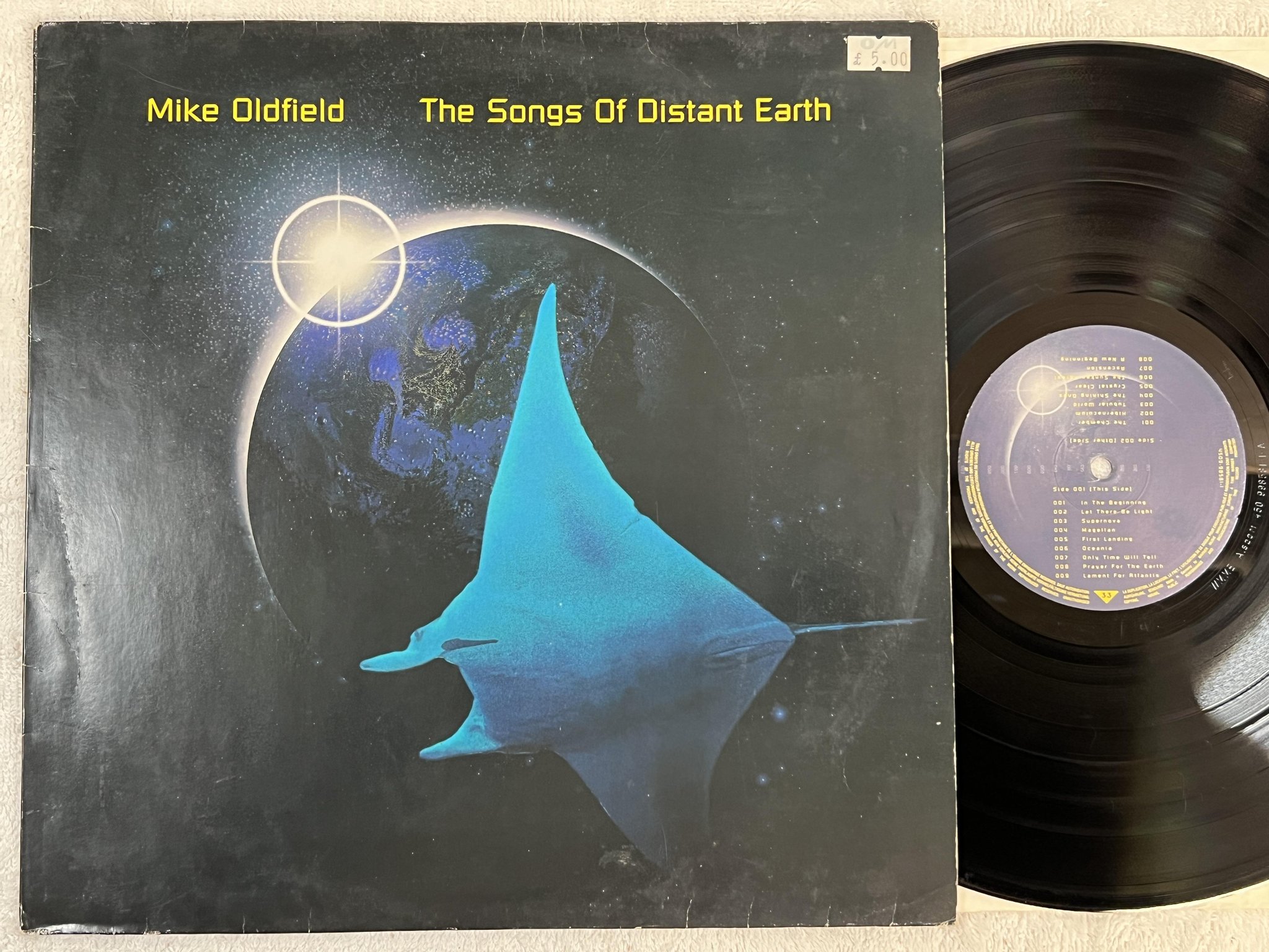 Omslagsbild för skivan MIKE OLDFIELD The Songs Of Distant Earth LP -94 WEA 4509-98581-1
