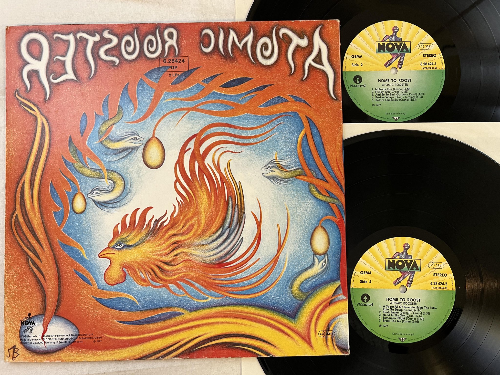 Omslagsbild för skivan ATOMIC ROOSTER home to roost 2xLP -77 Ger NOVA 628424-1