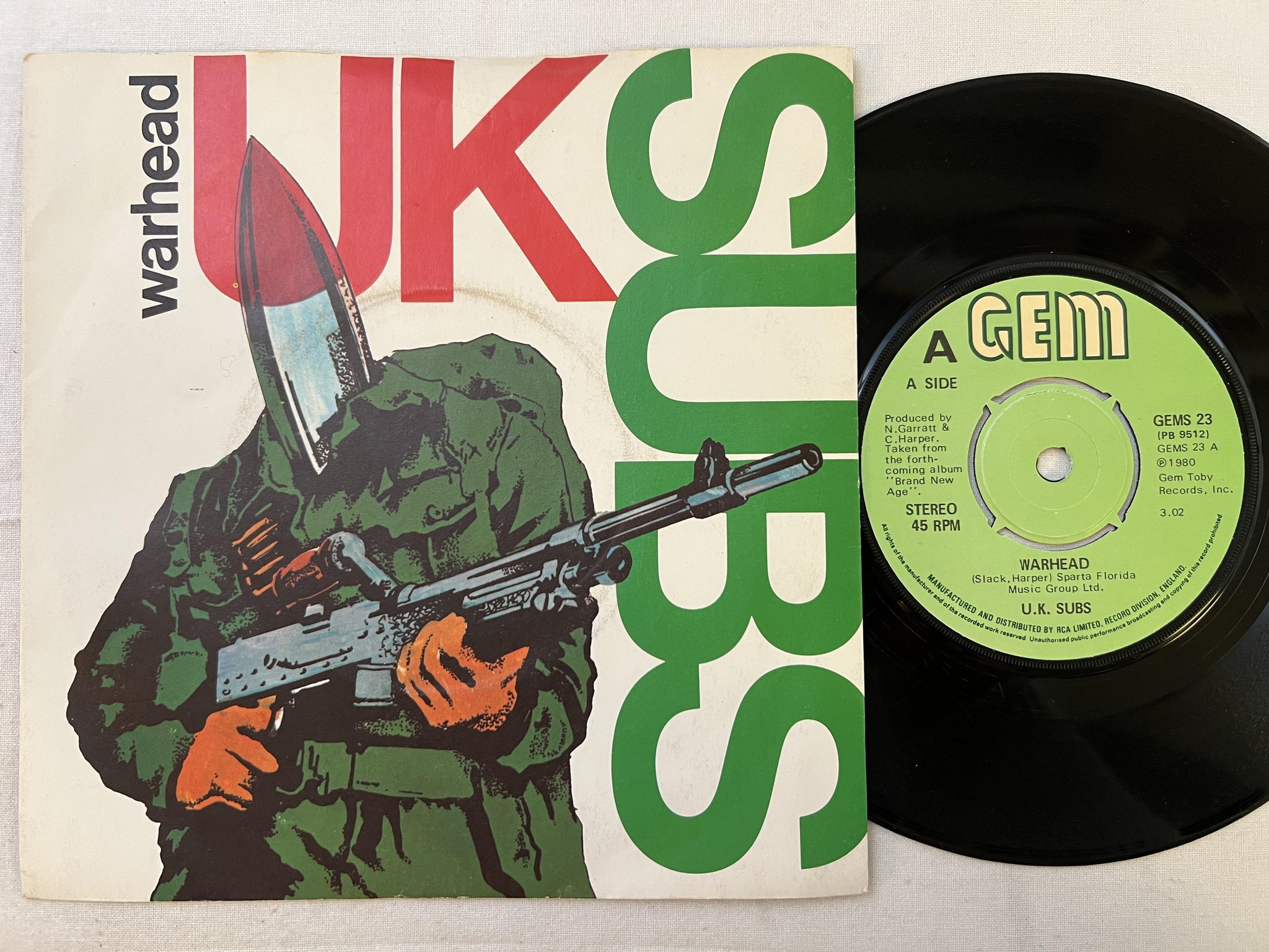 Omslagsbild för skivan UK SUBS warhead 7" -80 UK GEM GEMS 23