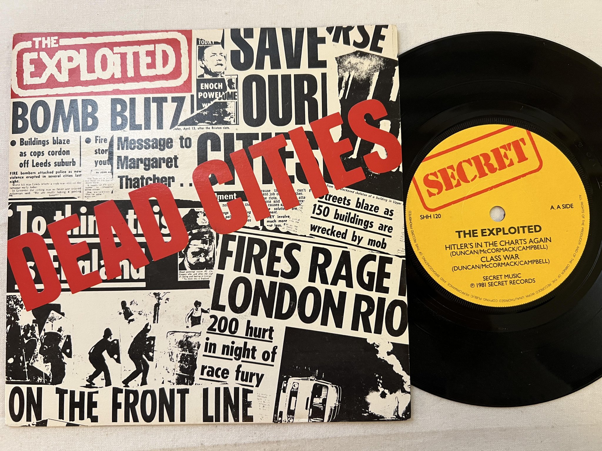 Omslagsbild för skivan THE EXPLOITED dead cities 7" -81 UK SECRET SHH 120