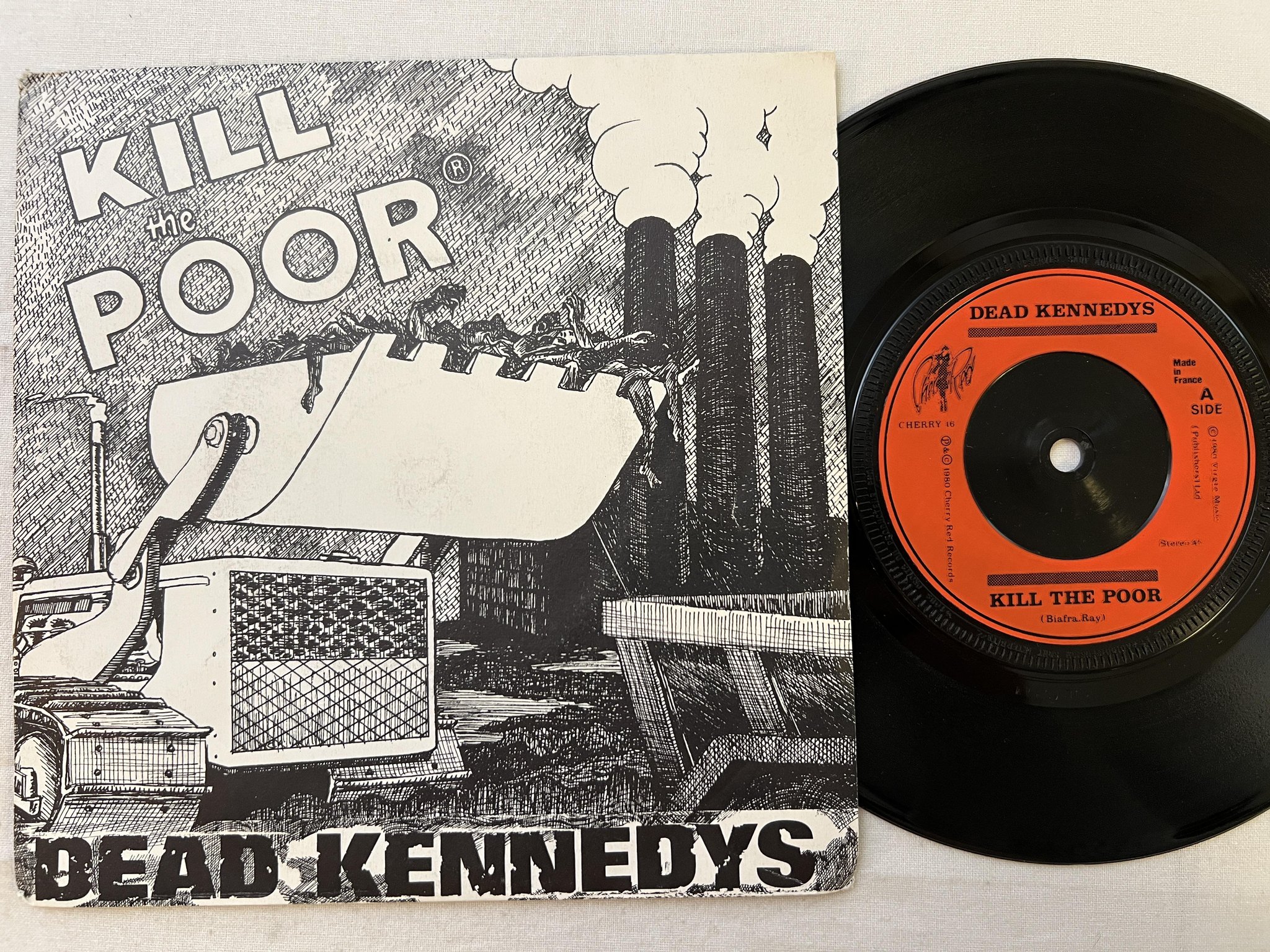 Omslagsbild för skivan DEAD KENNEDYS Kill The Poor 7" -80 CHERRY RED CHERRY 16