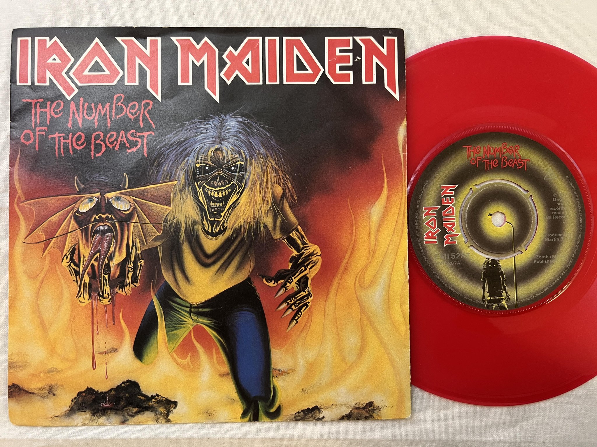 Omslagsbild för skivan IRON MAIDEN the number of the beast 7" 82 UK EMI 5287 ** red vinyl **