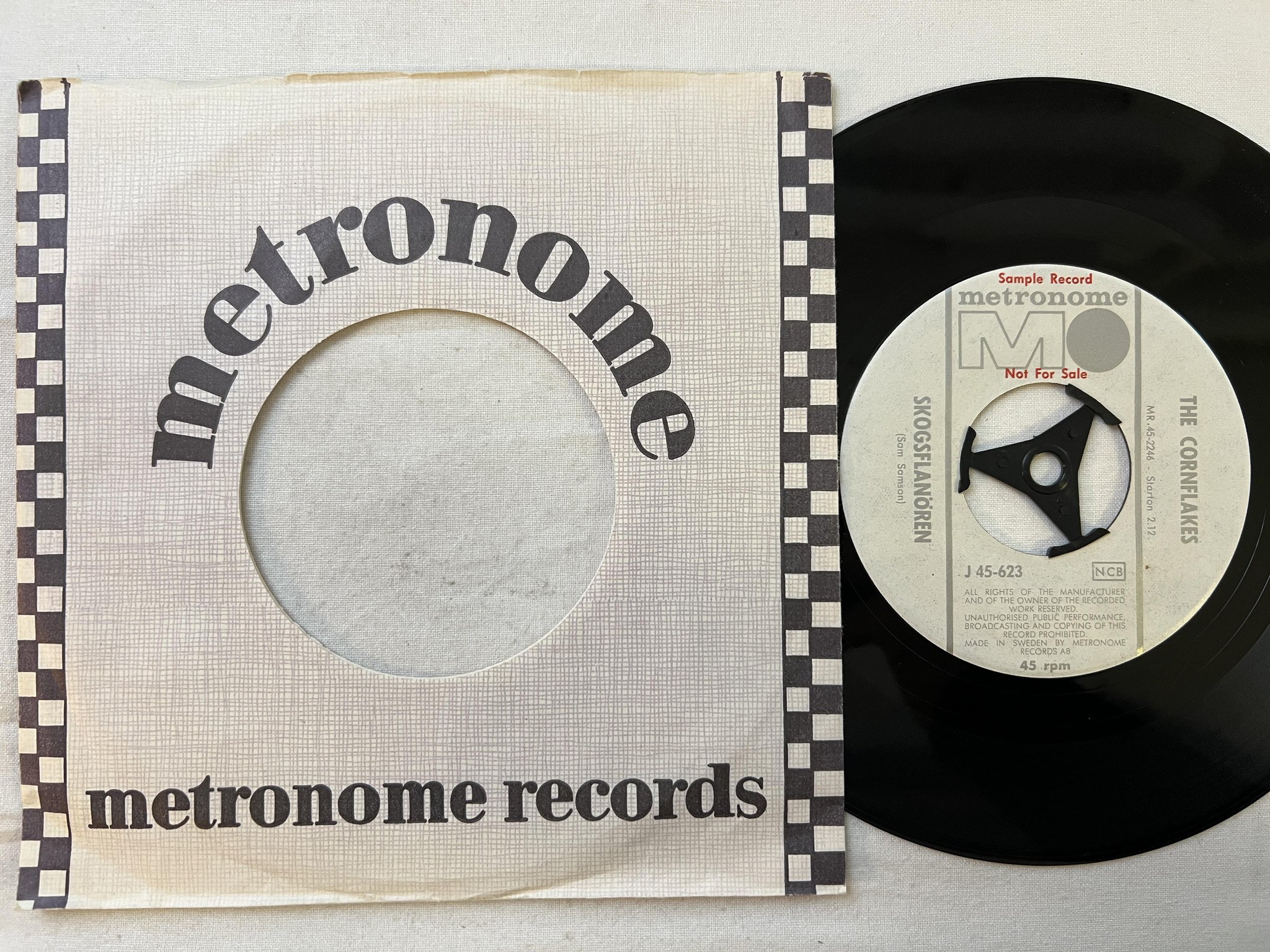 Omslagsbild för skivan THE CORNFLAKES skogsflanören 7" Swe METRONOME j 45-623 ** PROMO **