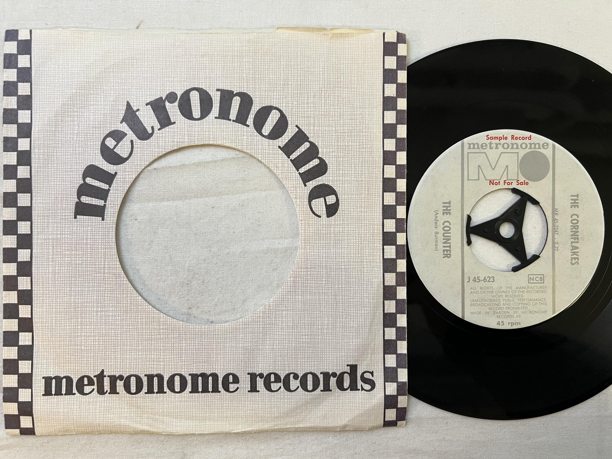 Omslagsbild för skivan THE CORNFLAKES skogsflanören 7" Swe METRONOME j 45-623 ** PROMO **