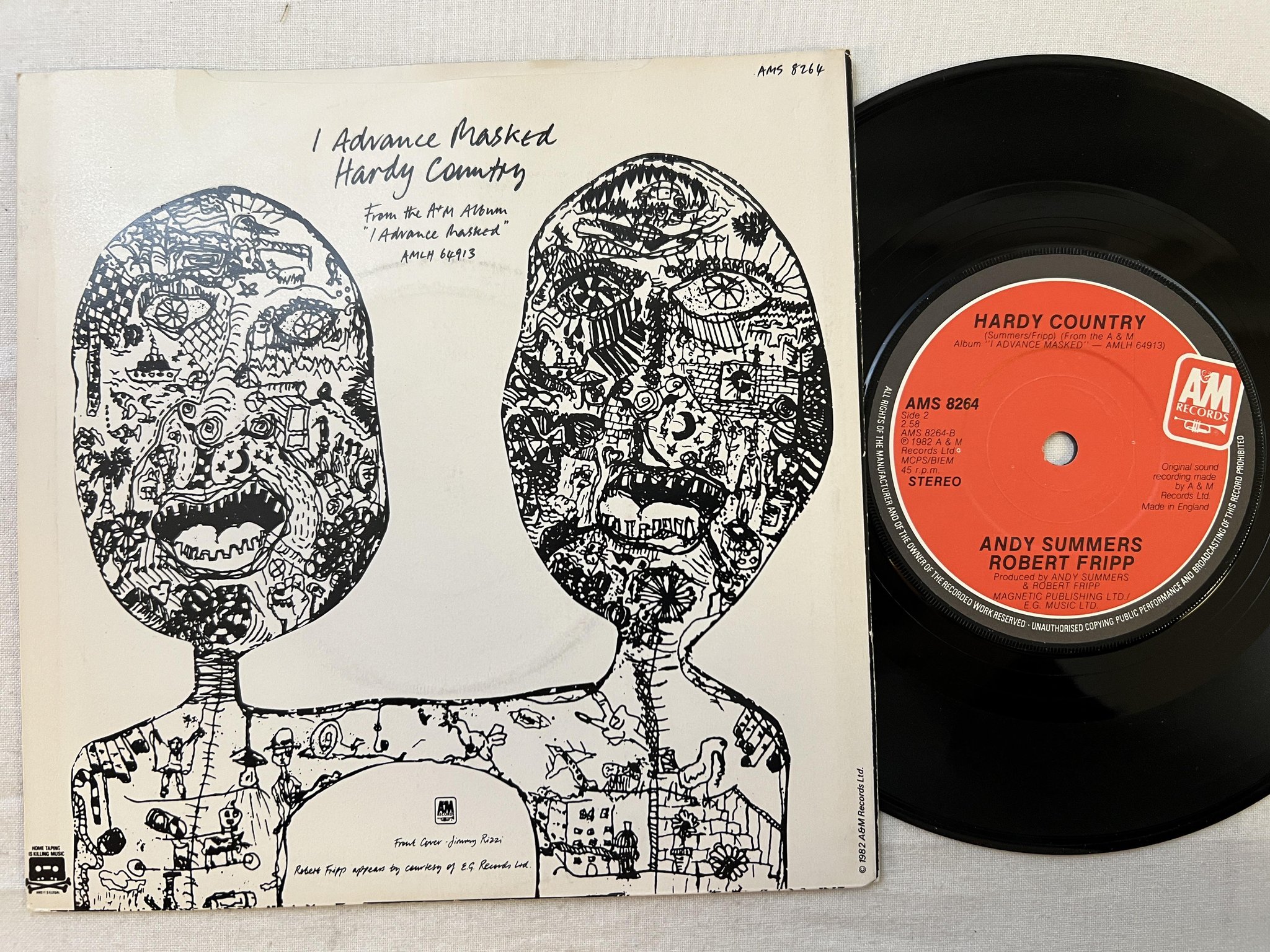 Omslagsbild för skivan ANDY SUMMERS / ROBERT FRIPP advance masked 7" 82 UK A&M AMS 8264