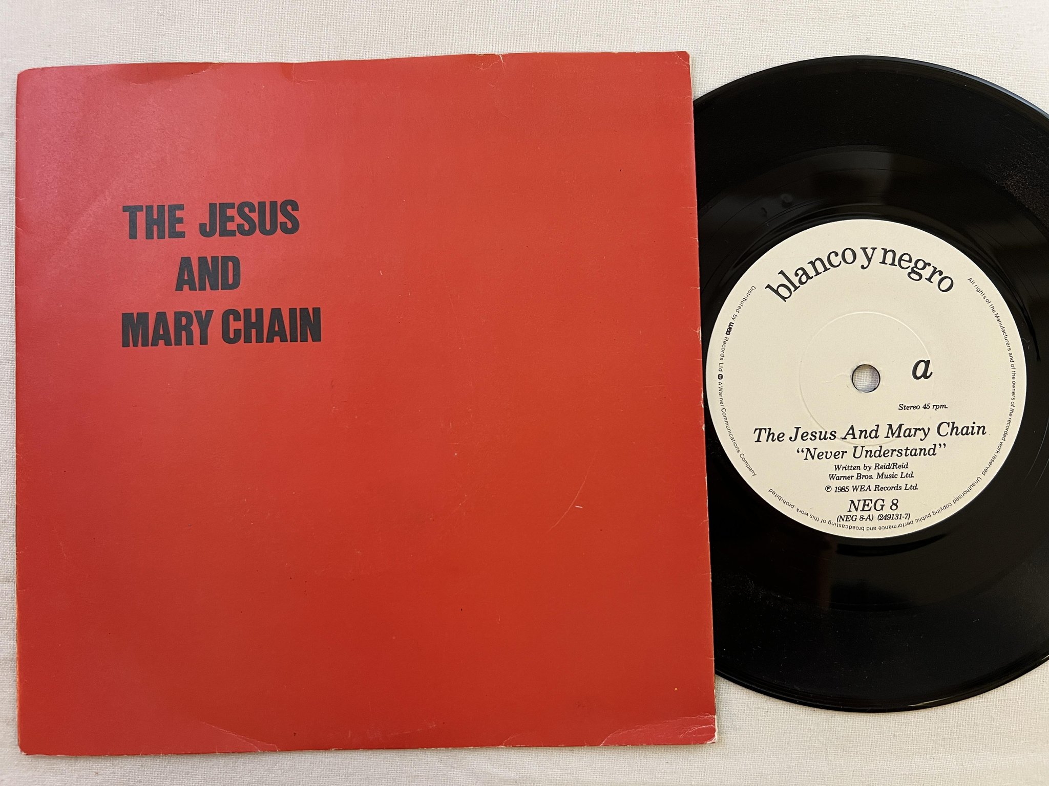 Omslagsbild för skivan THE JESUS AND MARY CHAIN never understand 7" -85 BLANCO Y NEGRO NEG-8