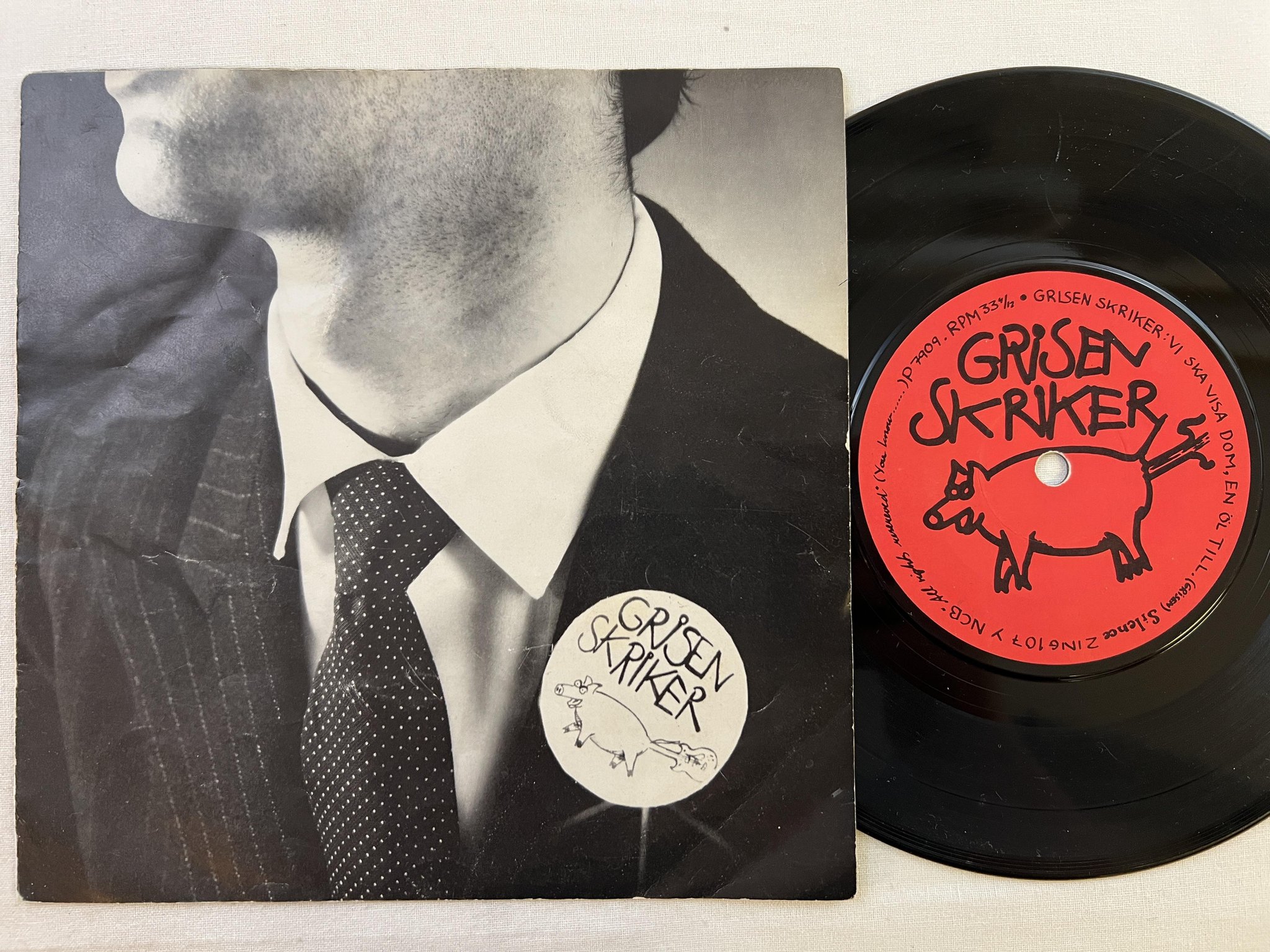 Omslagsbild för skivan GRISEN SKRIKER Grisen Skriker's Sista EP 7" -79 silence ZING 107