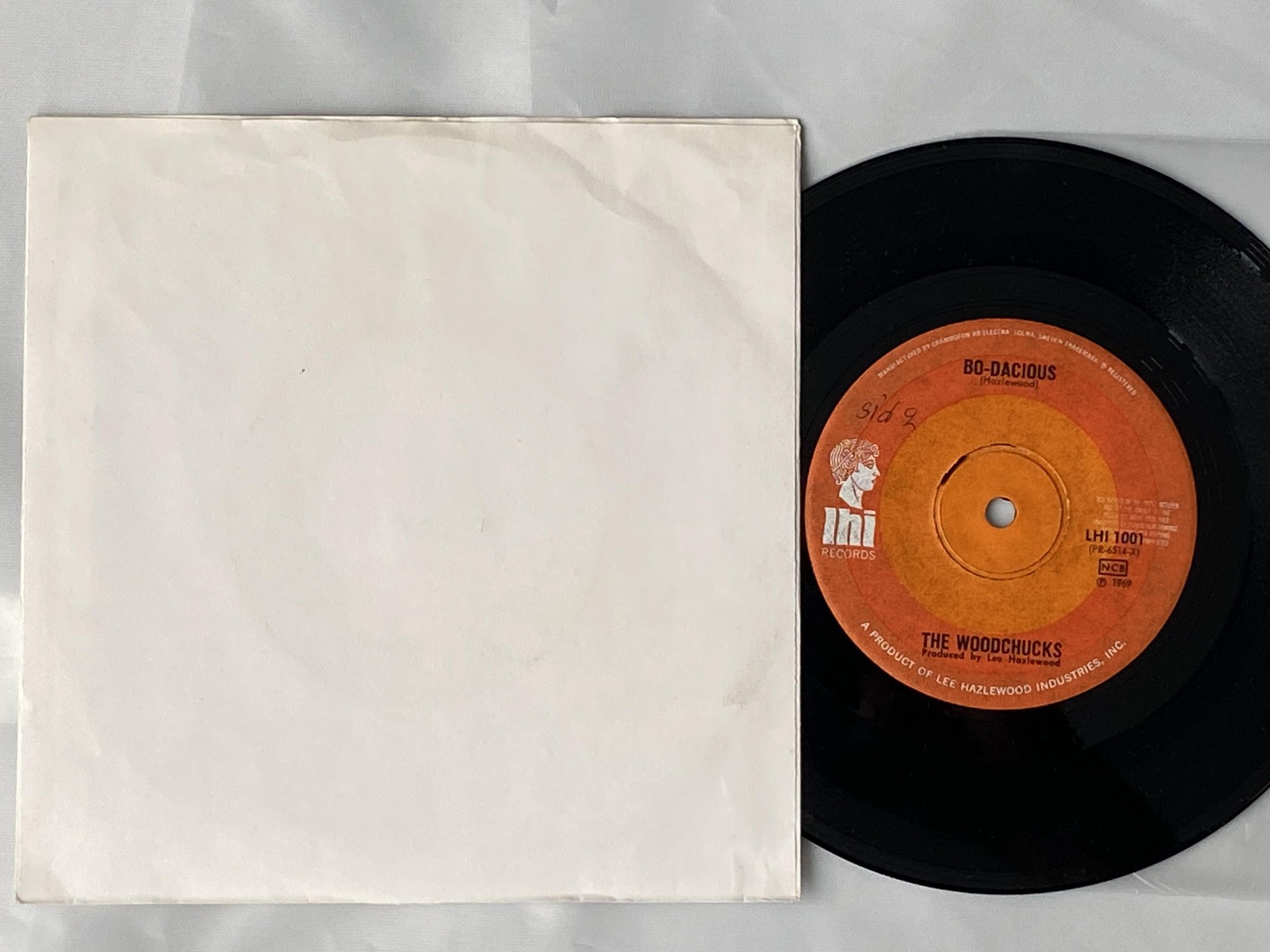 Omslagsbild för skivan THE WOODCHUCKS angry generation 7" -69 LHI 1001 *** Lee Hazlewood ***