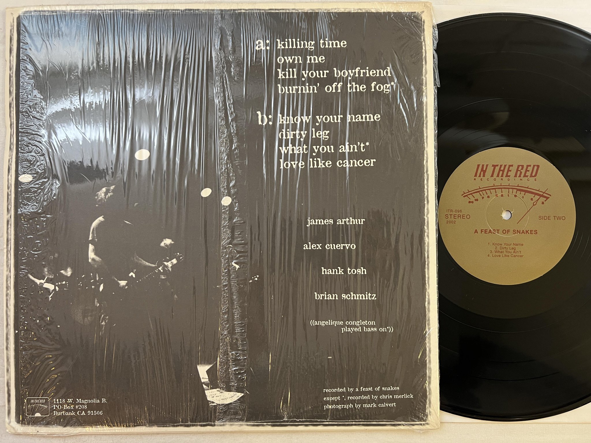 Omslagsbild för skivan A FEAST OF SNAKES s/t LP 2002 US IN THE RED ITR096