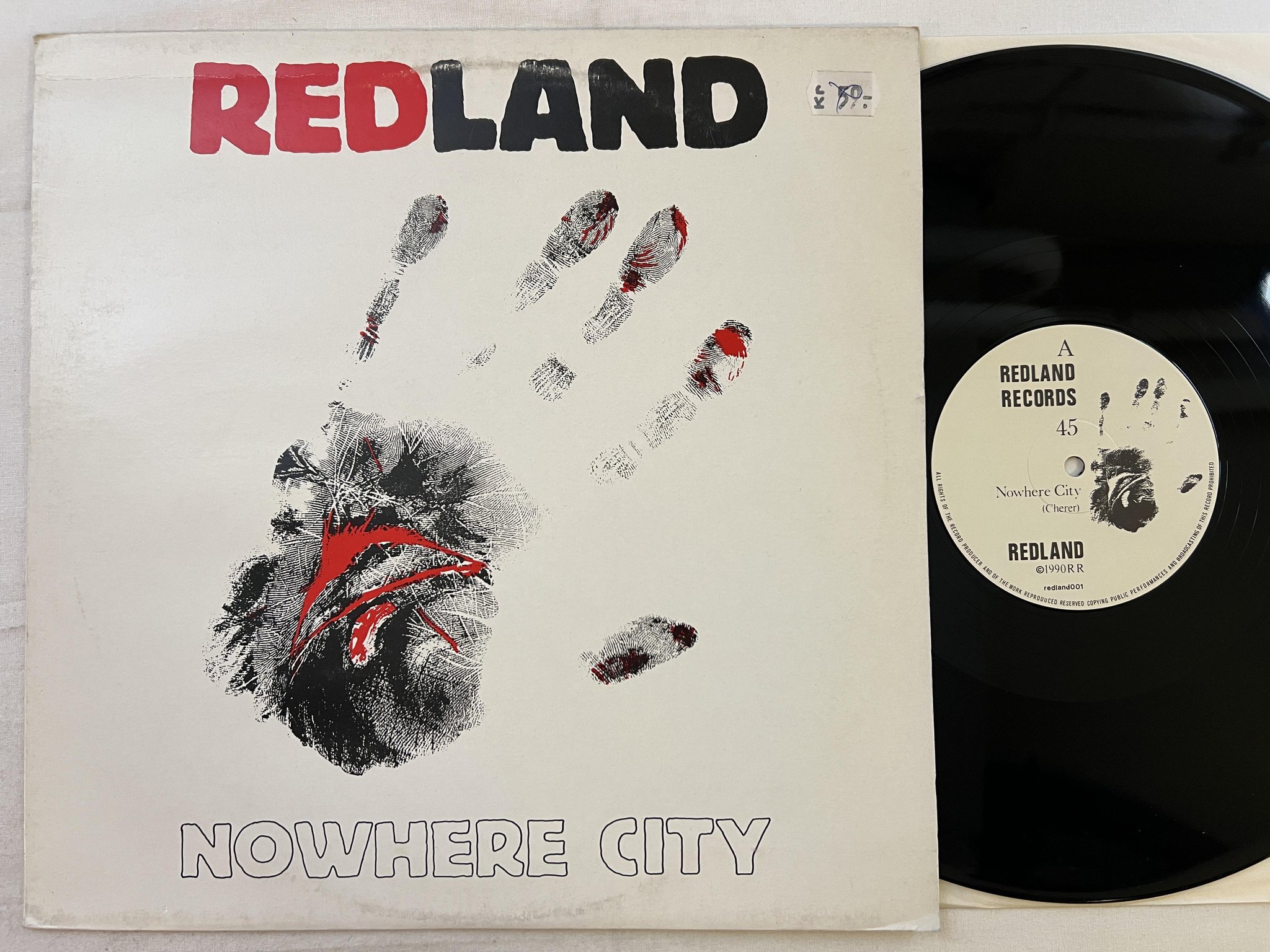 Omslagsbild för skivan REDLAND nowhere city 12" -90 UK REDLAND 001 *** INDIE ***